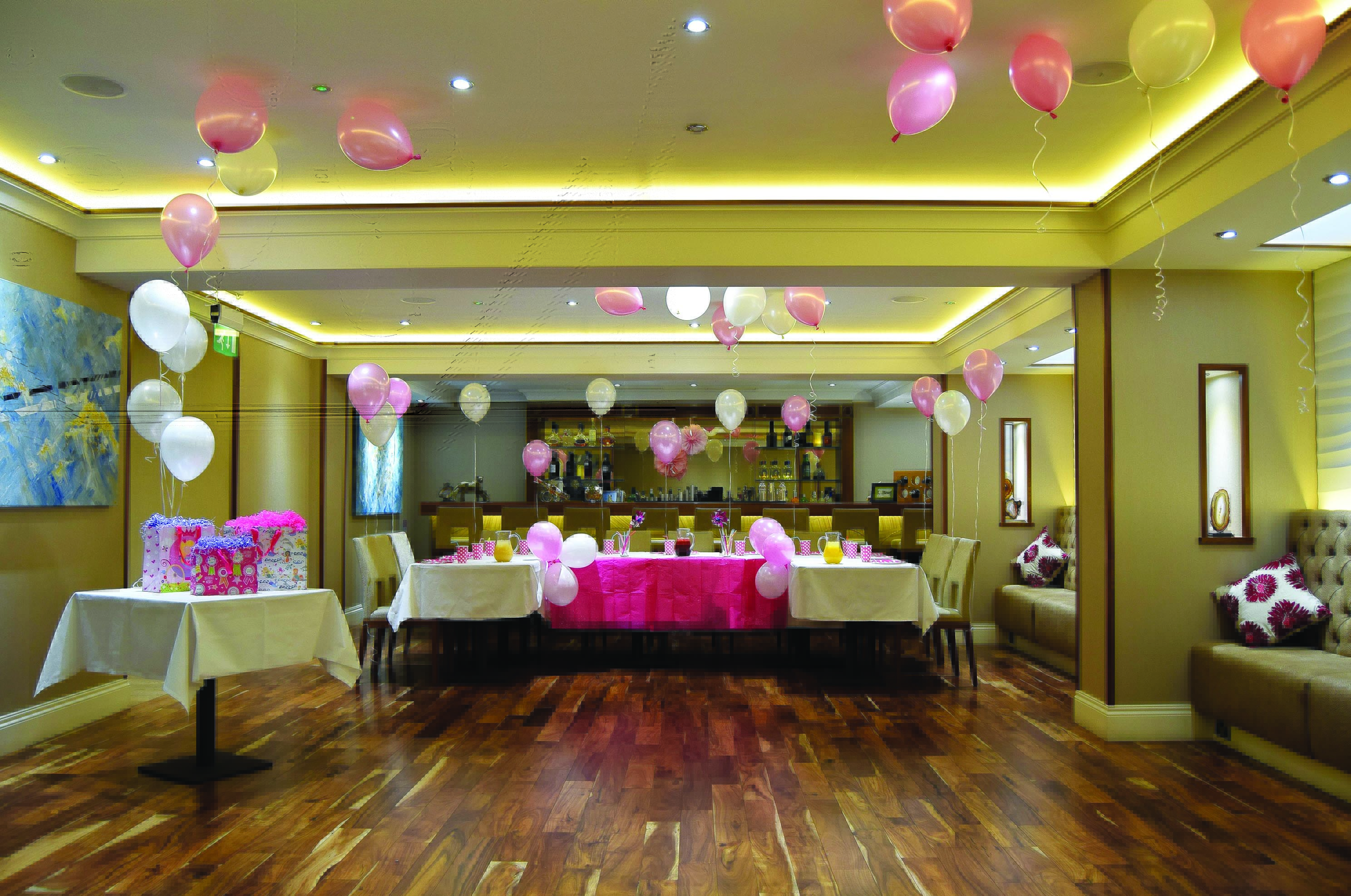 Coloured Canyon Dining Room with pink decor, ideal for baby showers and birthday parties.