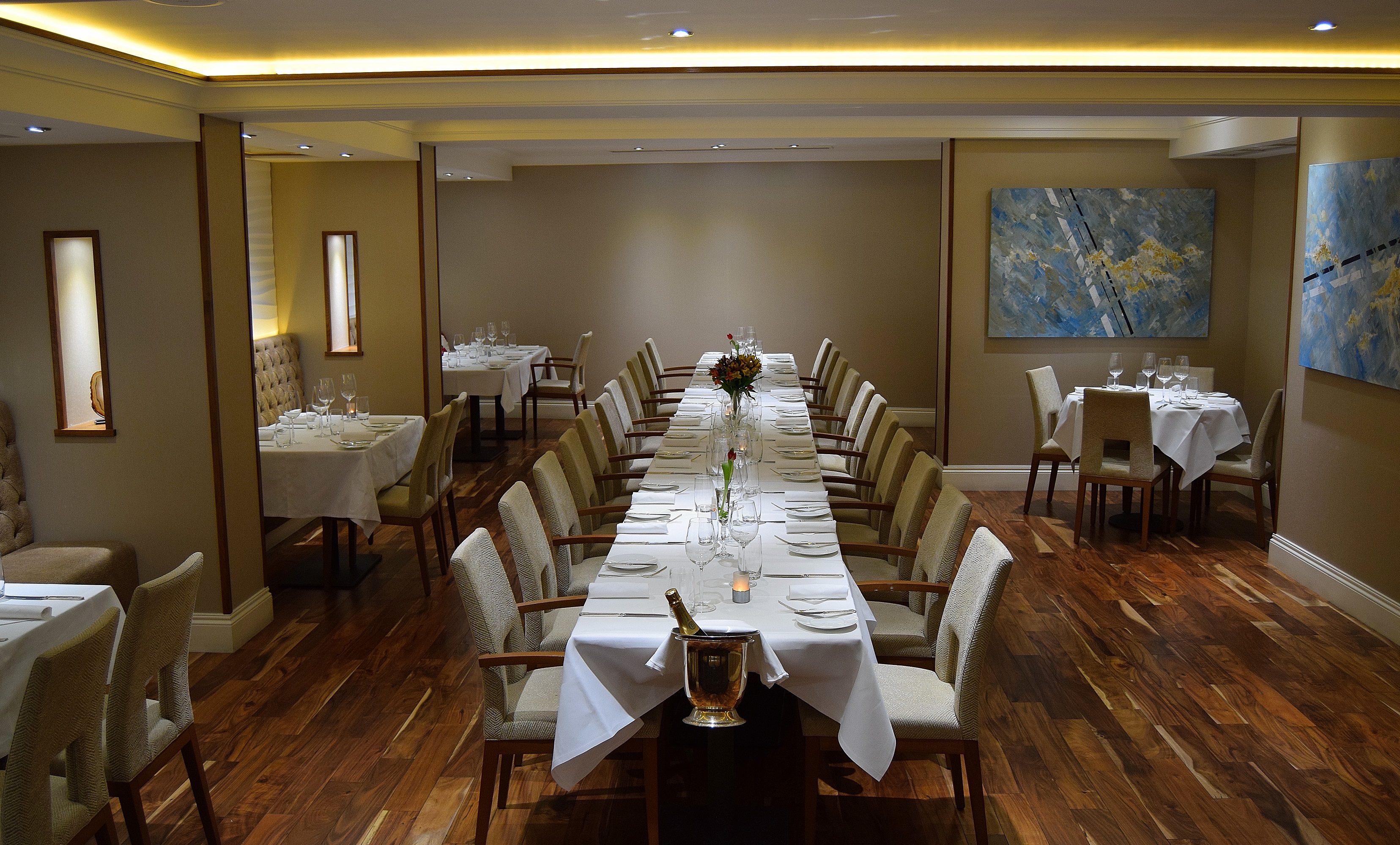 Coloured Canyon Dining Room: elegant table, warm lighting for corporate events and private gatherings.