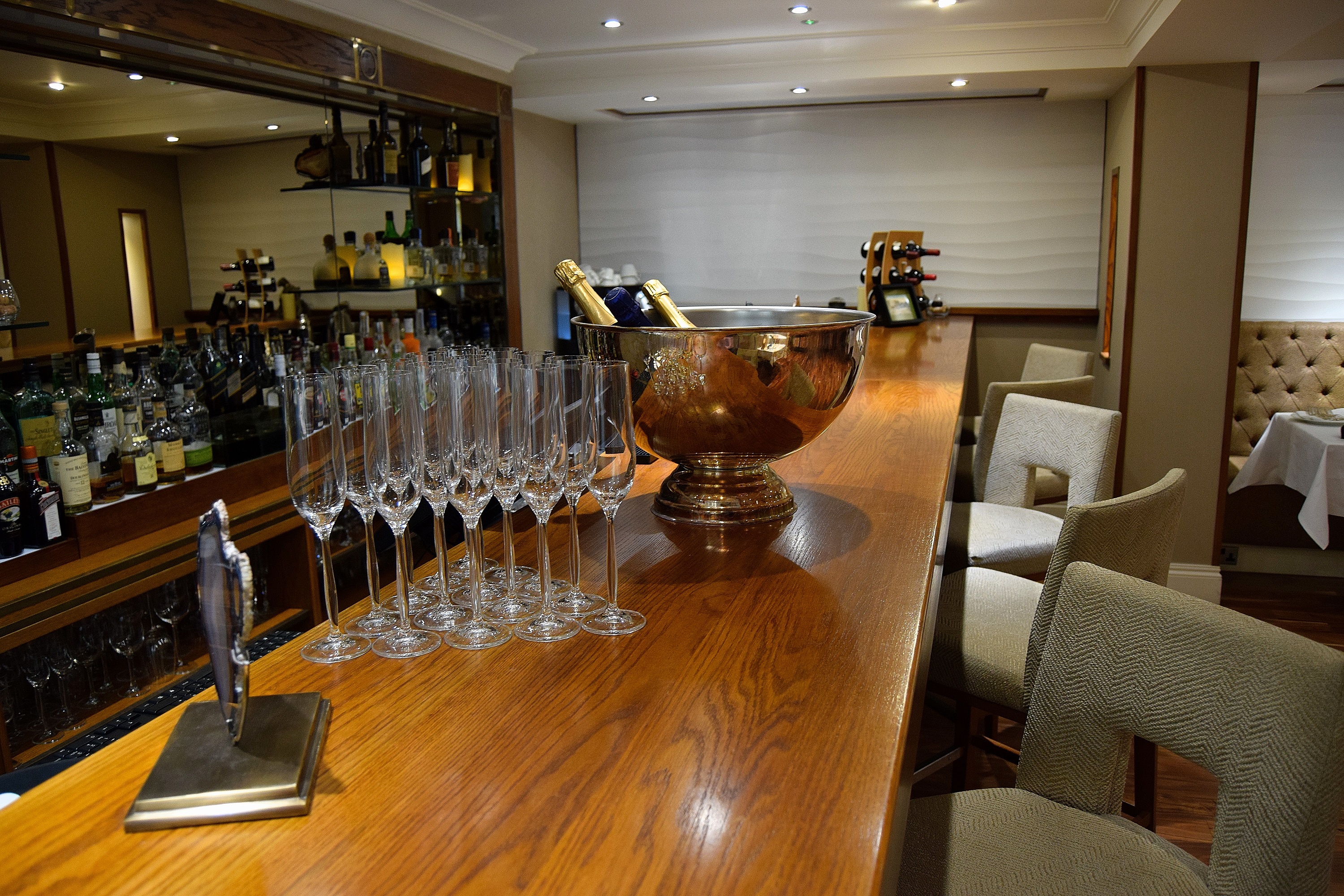 Coloured Canyon Dining Room bar with polished wood, ideal for upscale events and receptions.