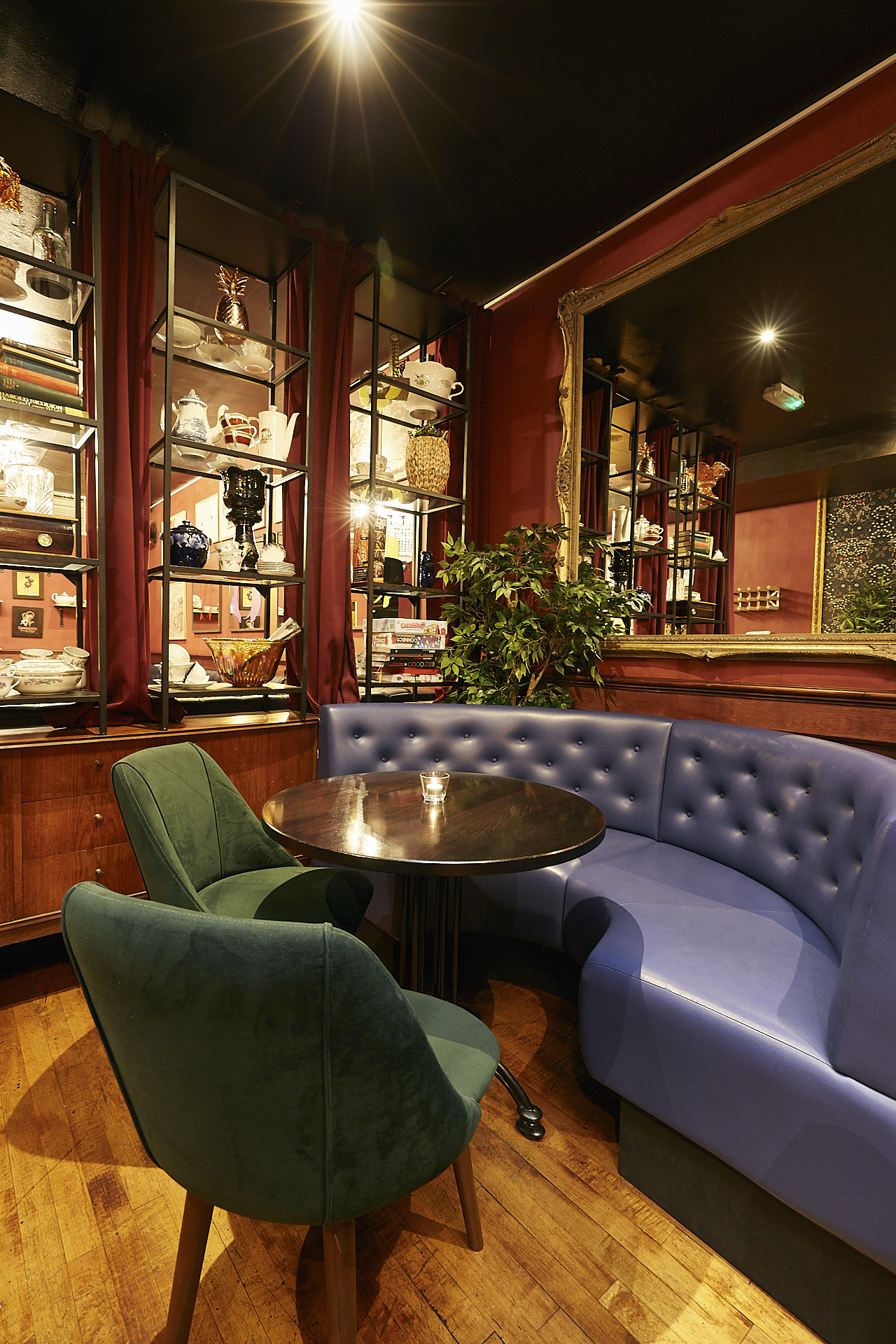 Cozy seating area in Back Lounge, Little Bat for intimate meetings and gatherings.