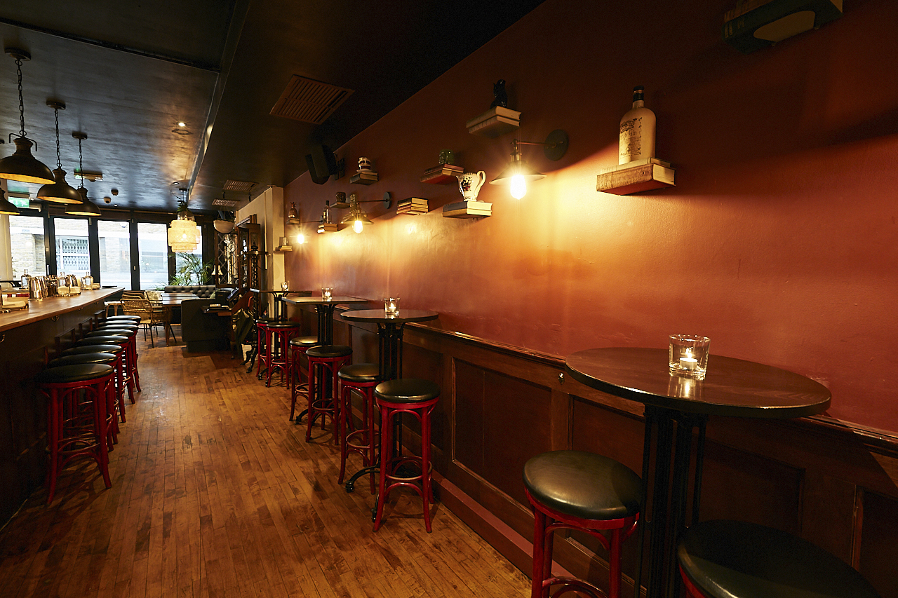 Cozy venue in Little Bat with warm lighting, perfect for networking events and gatherings.