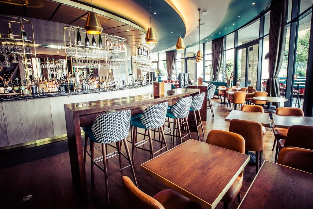 Modern Rotunda Bar venue with spacious seating for meetings and events.