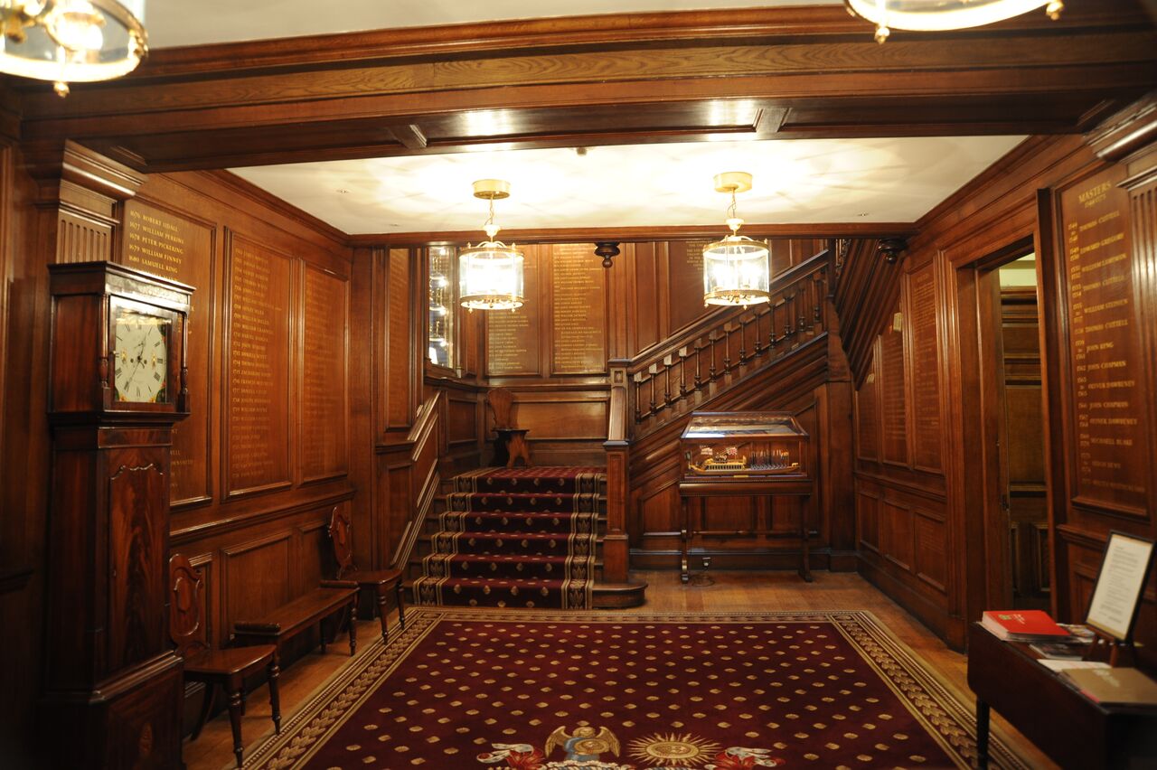 Elegant Tallow Chandlers' Hall courtyard with wooden paneling, ideal for upscale events.