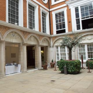 Charming courtyard at Tallow Chandlers' Hall for outdoor events and receptions.