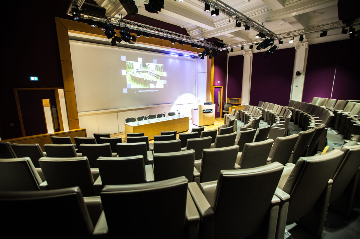 Naim Dangoor Auditorium with tiered seating for corporate meetings and conferences.