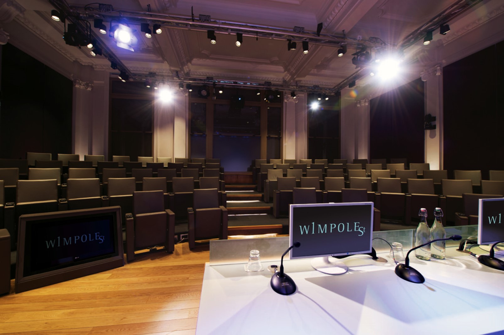 Naim Dangoor Auditorium with tiered seating, ideal for corporate meetings and seminars.
