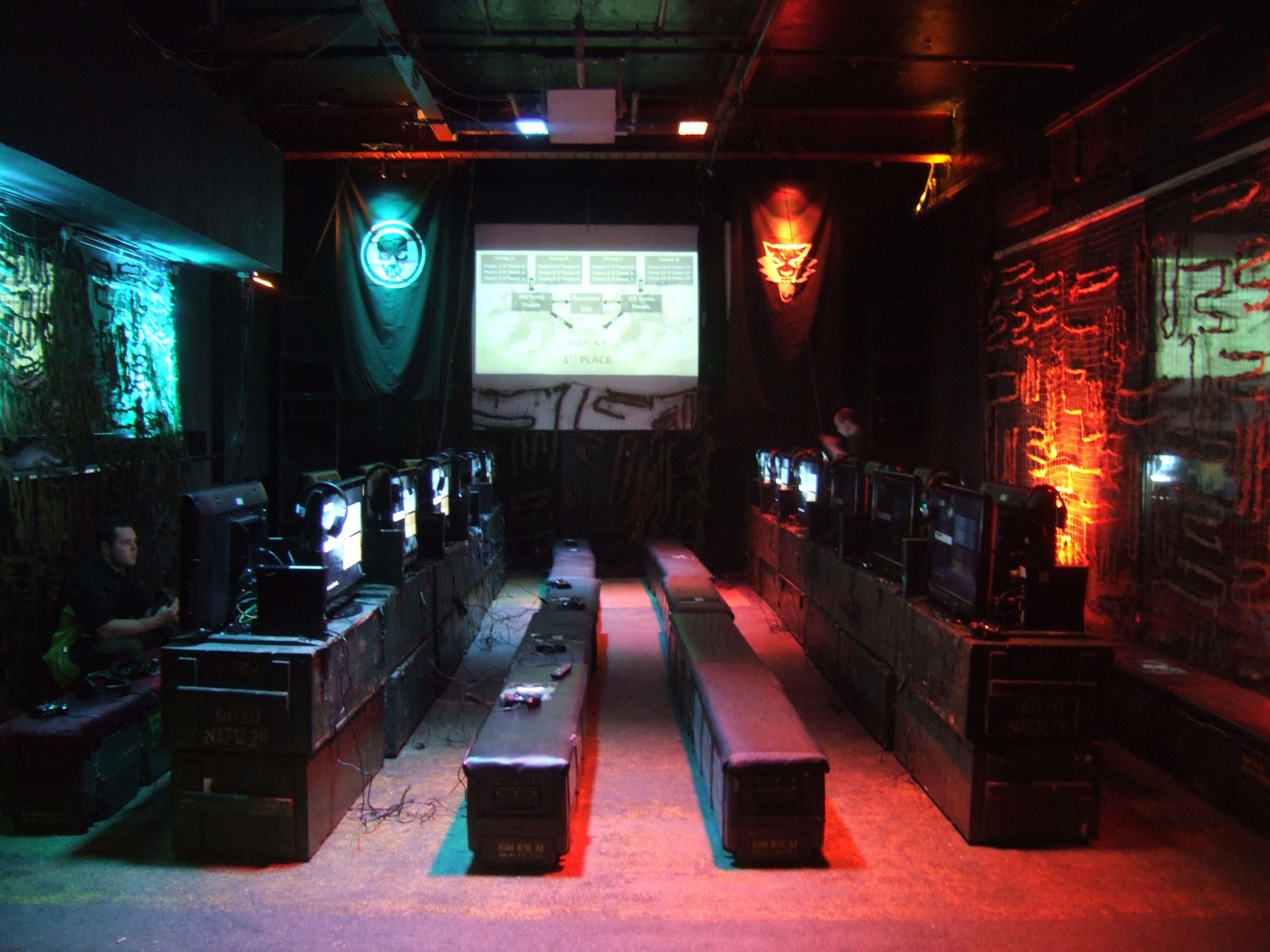 Gaming event setup with computer stations and ambient lighting at Electrowerkz.