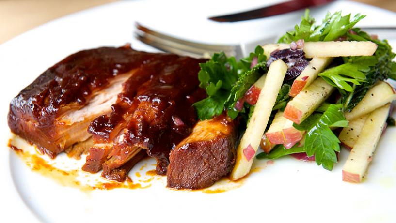 Whole Venue Exclusive Hire meal: barbecued meat with salad for corporate events.