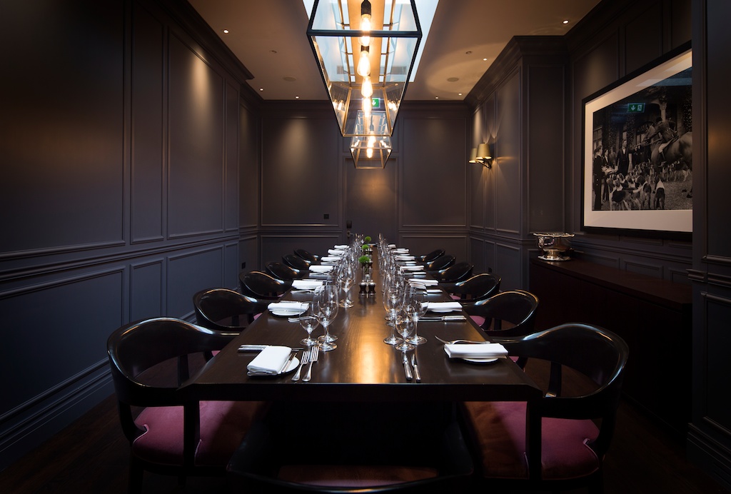 Elegant private dining room at The London EDITION for corporate events and intimate gatherings.