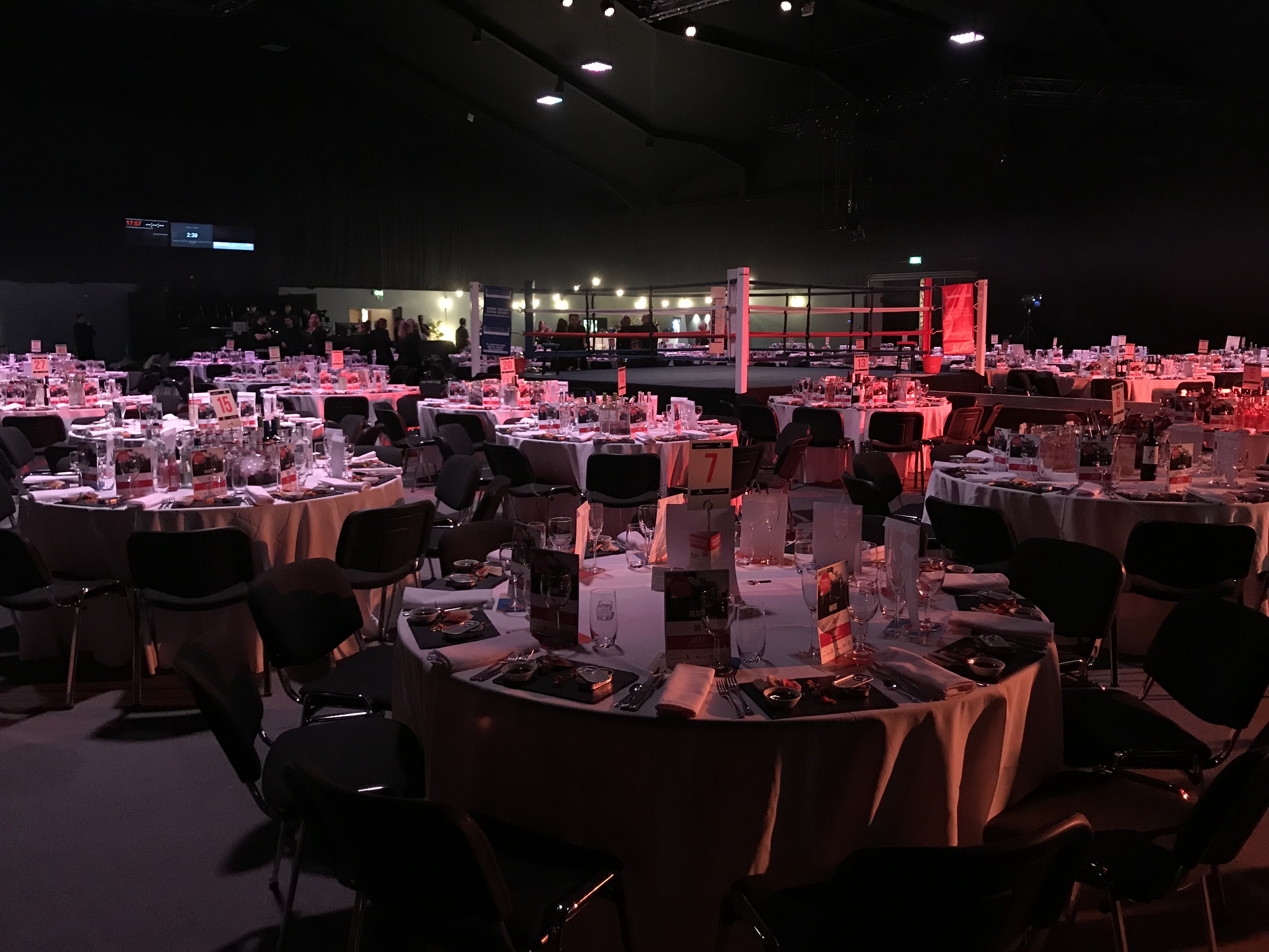 Elegant auditorium with round tables, perfect for conferences and events.