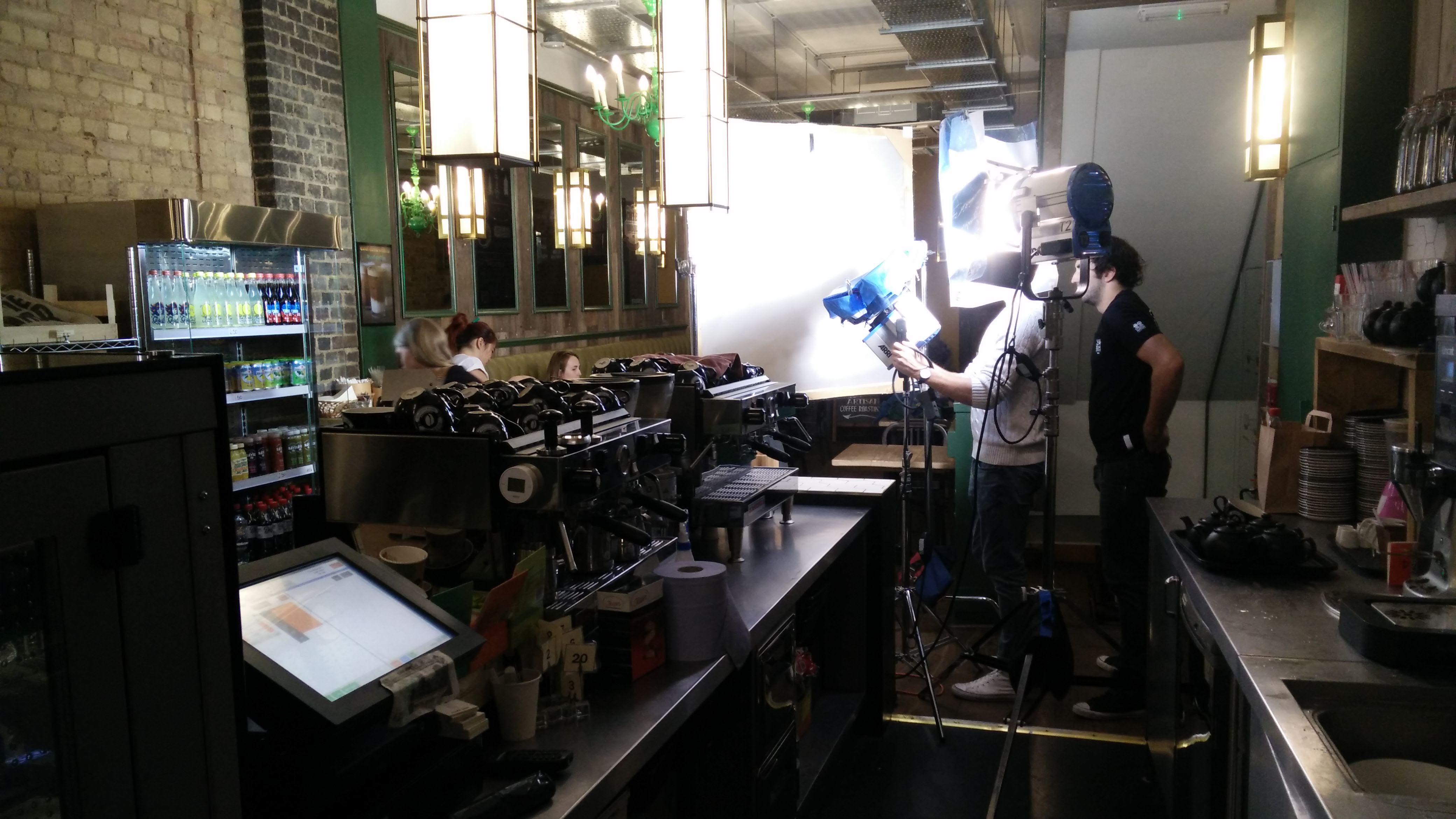 Basement workspace at Cafe Zee with lighting, ideal for events and promotions.