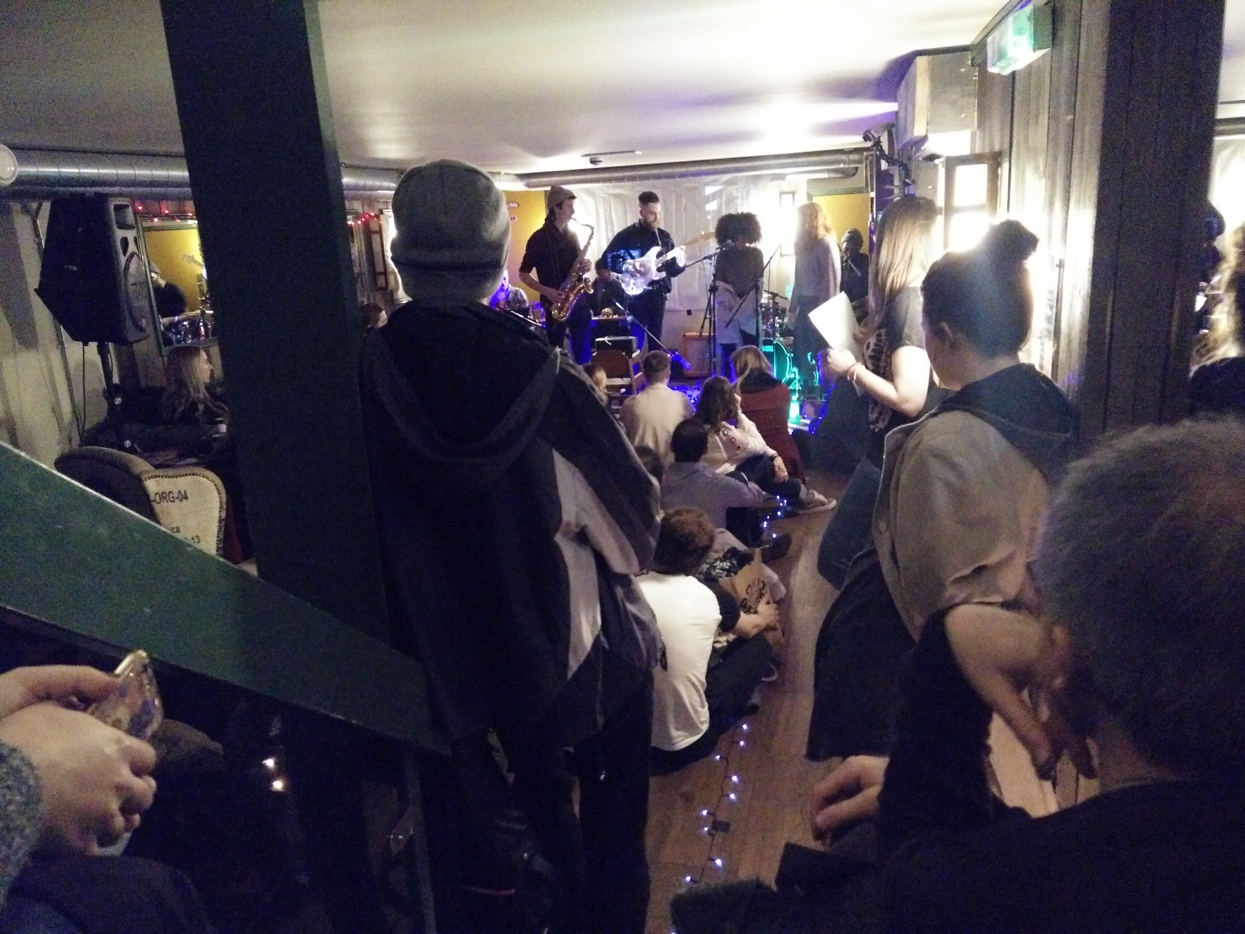 Lively cafe venue with intimate atmosphere for live performances and networking events.