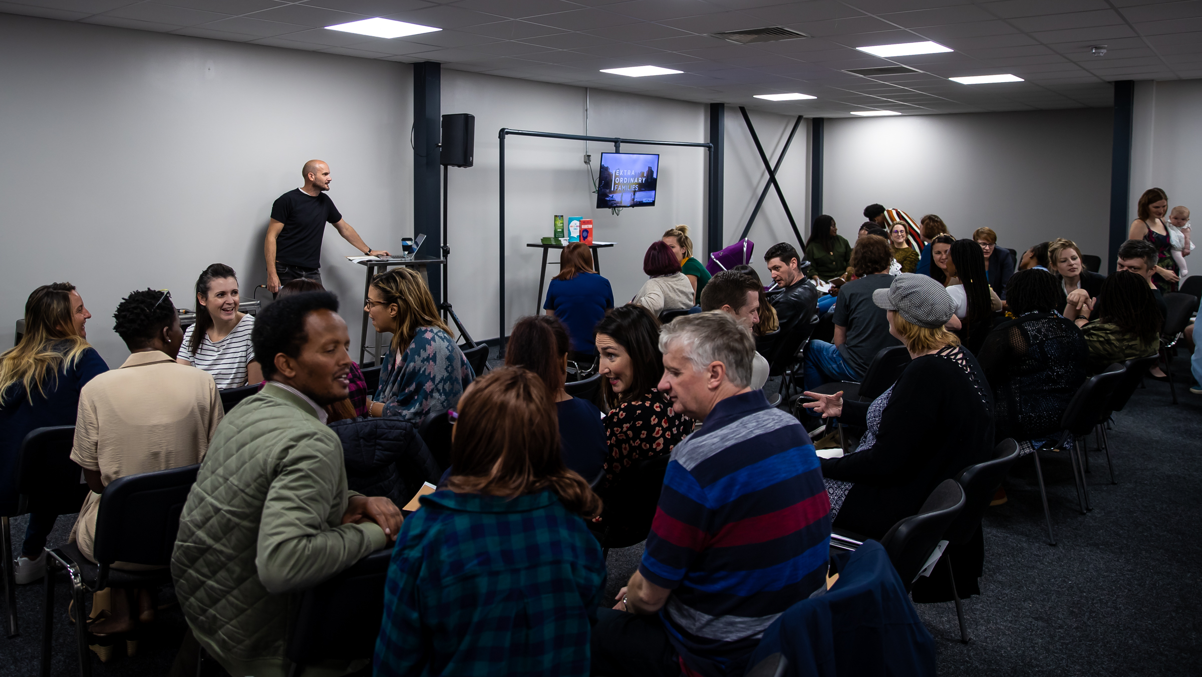Dynamic meeting space with engaged attendees for networking and collaboration events.