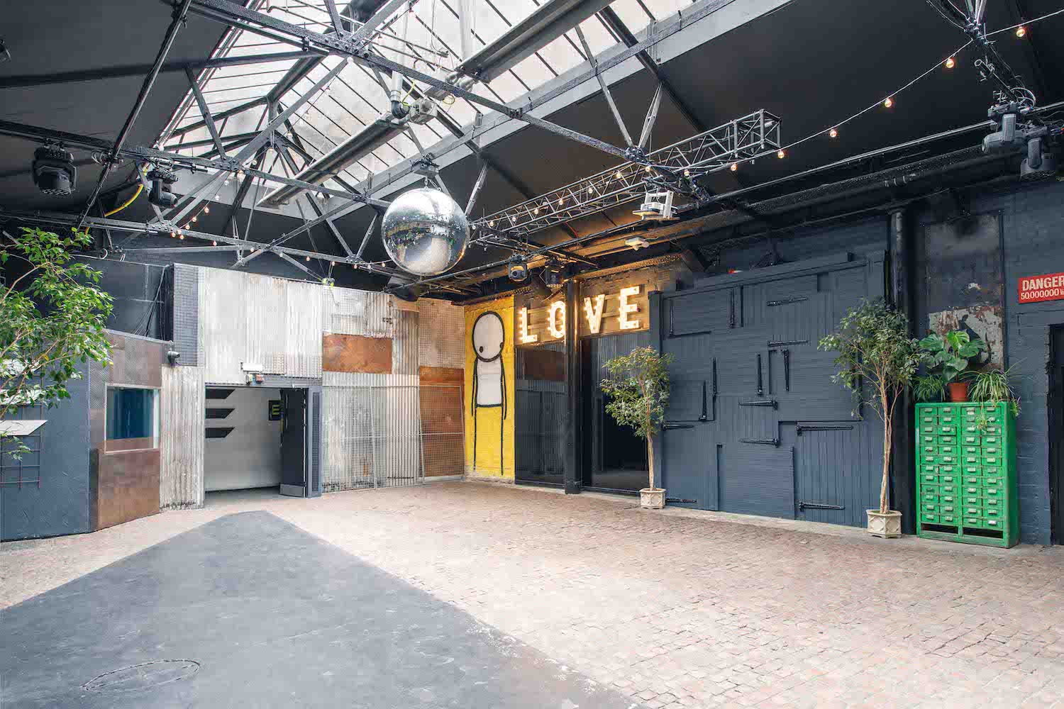 Industrial venue, high ceilings, urban event space, creative branding