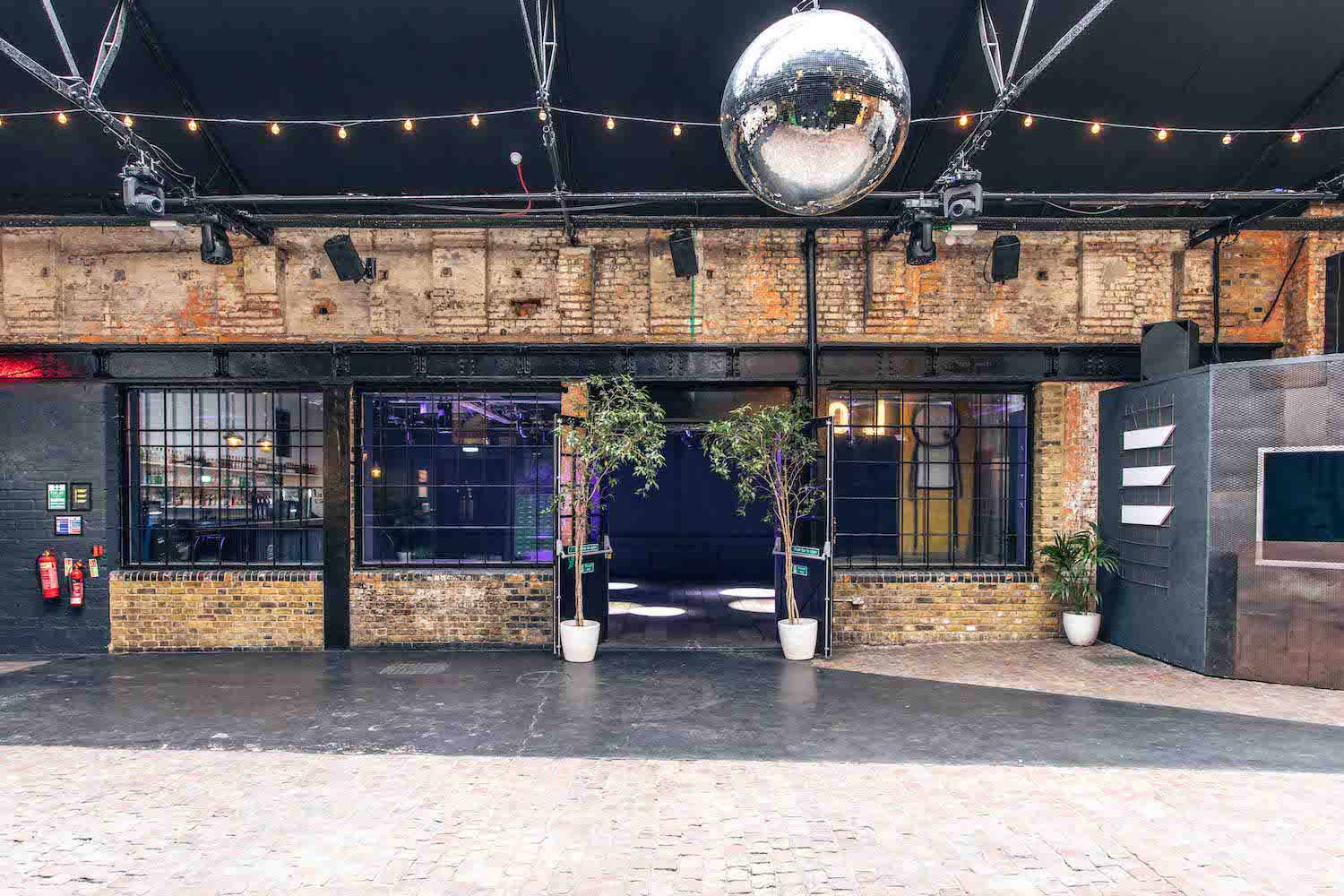 Industrial event venue, disco ball, product launch party