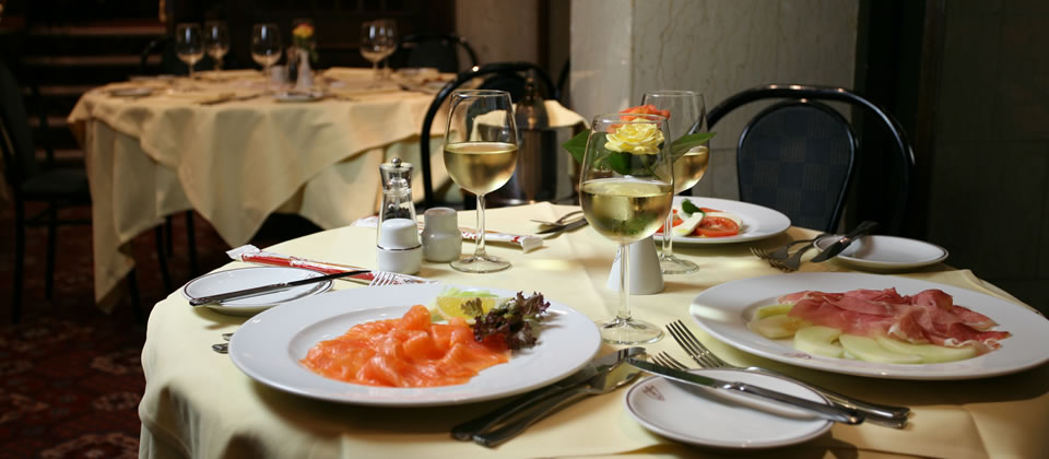 Elegant dining table at Bolton's Main Restaurant for corporate dinners and networking events.