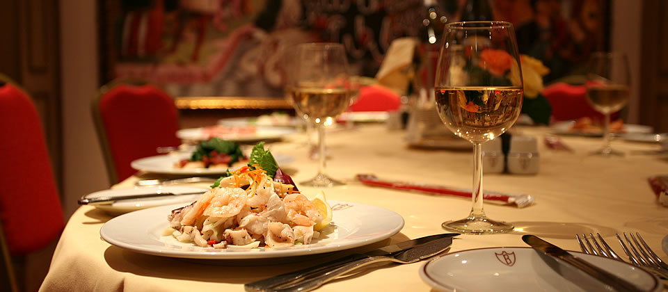 Elegant dining table in Venetian Room, perfect for formal events and galas.