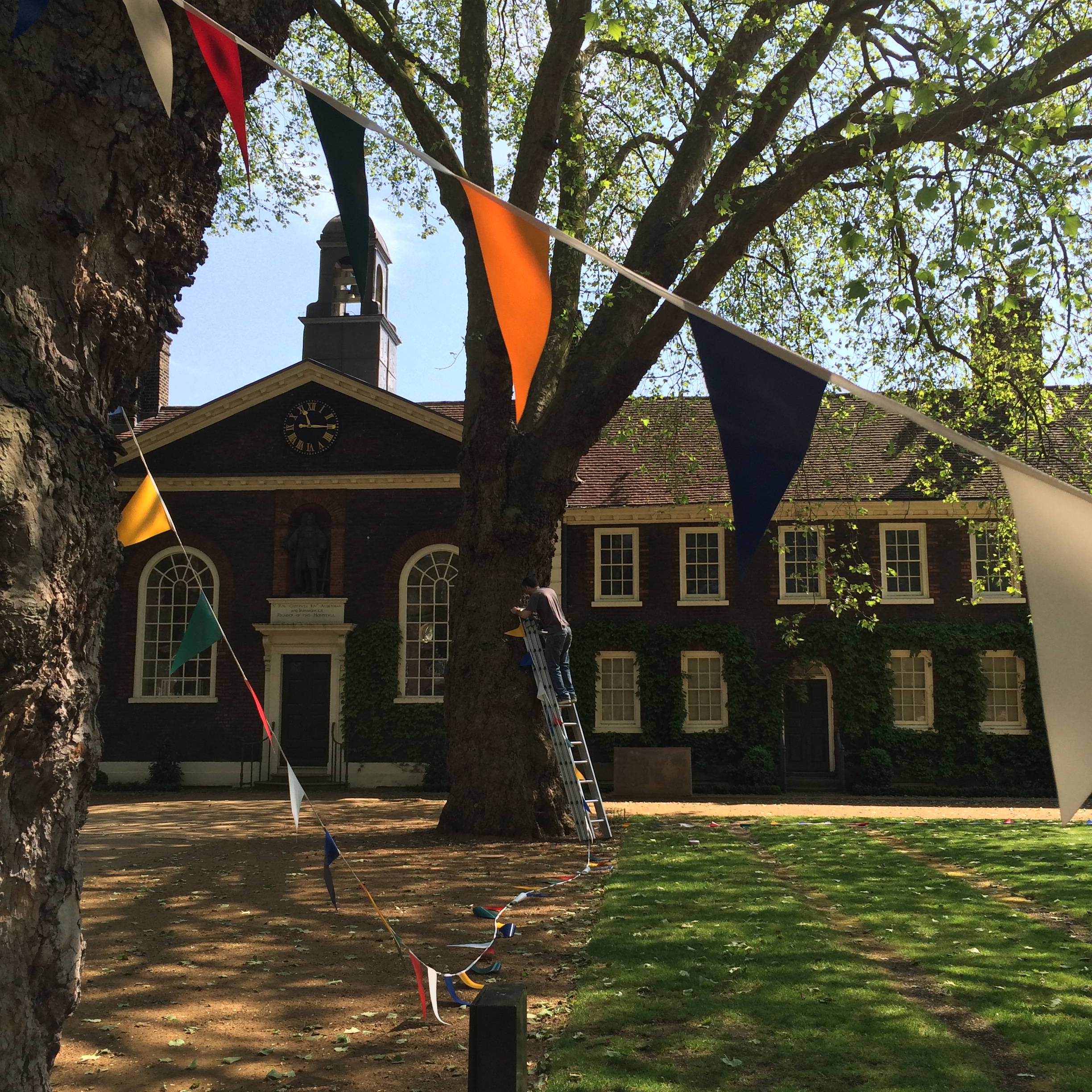 Front Lawns at The Museum of the Home, elegant venue with colorful bunting for events.
