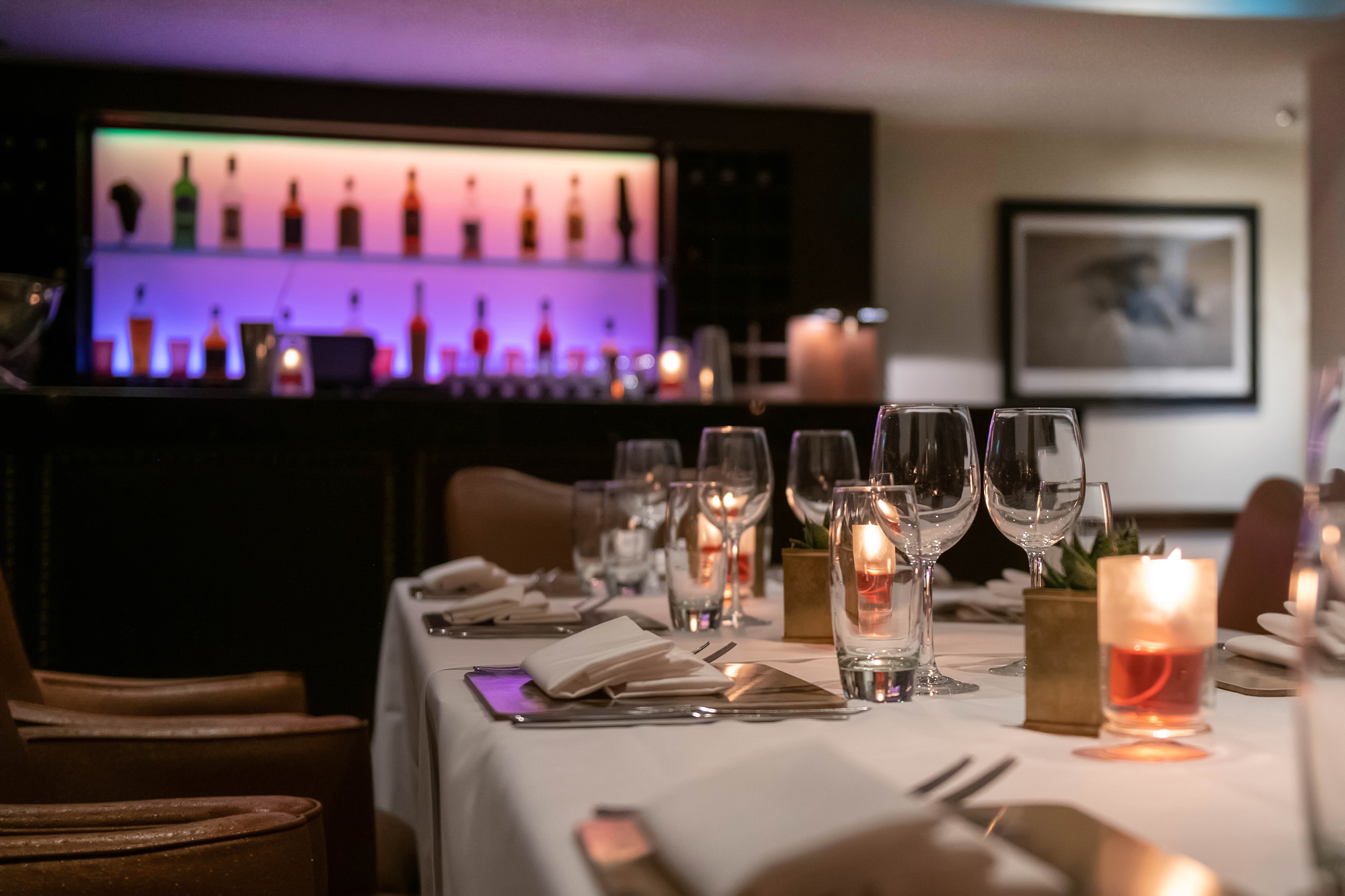 Elegant dining table setup at 43 Below for upscale events and corporate dinners.