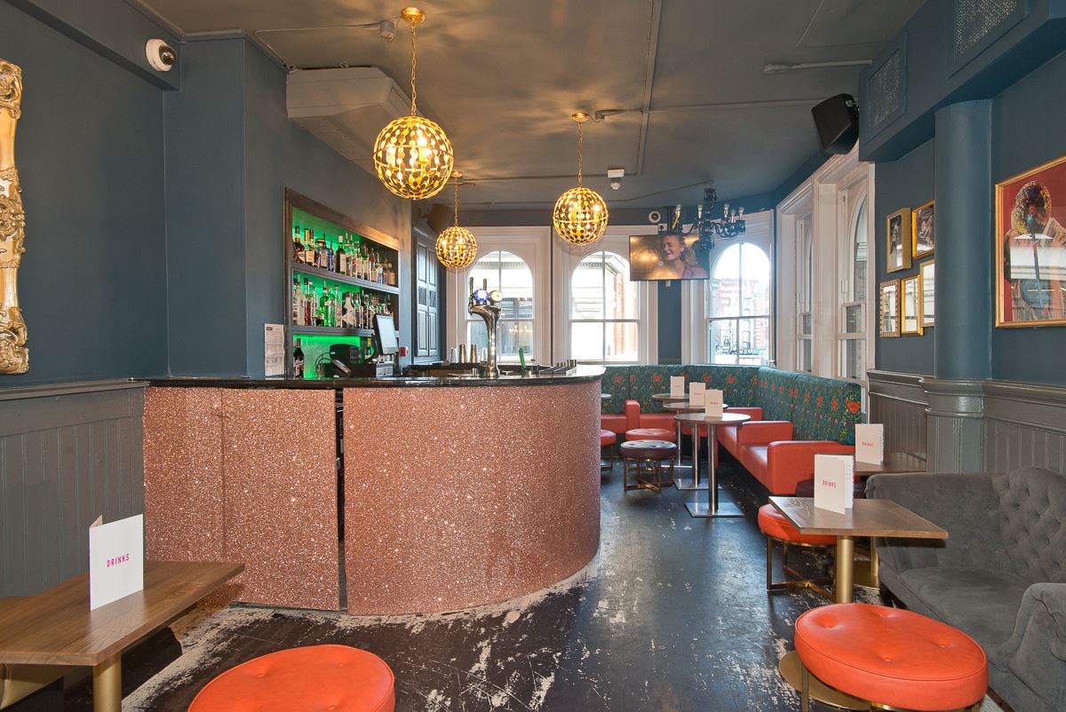 Chic cocktail lounge in The Village, perfect for intimate gatherings and receptions.