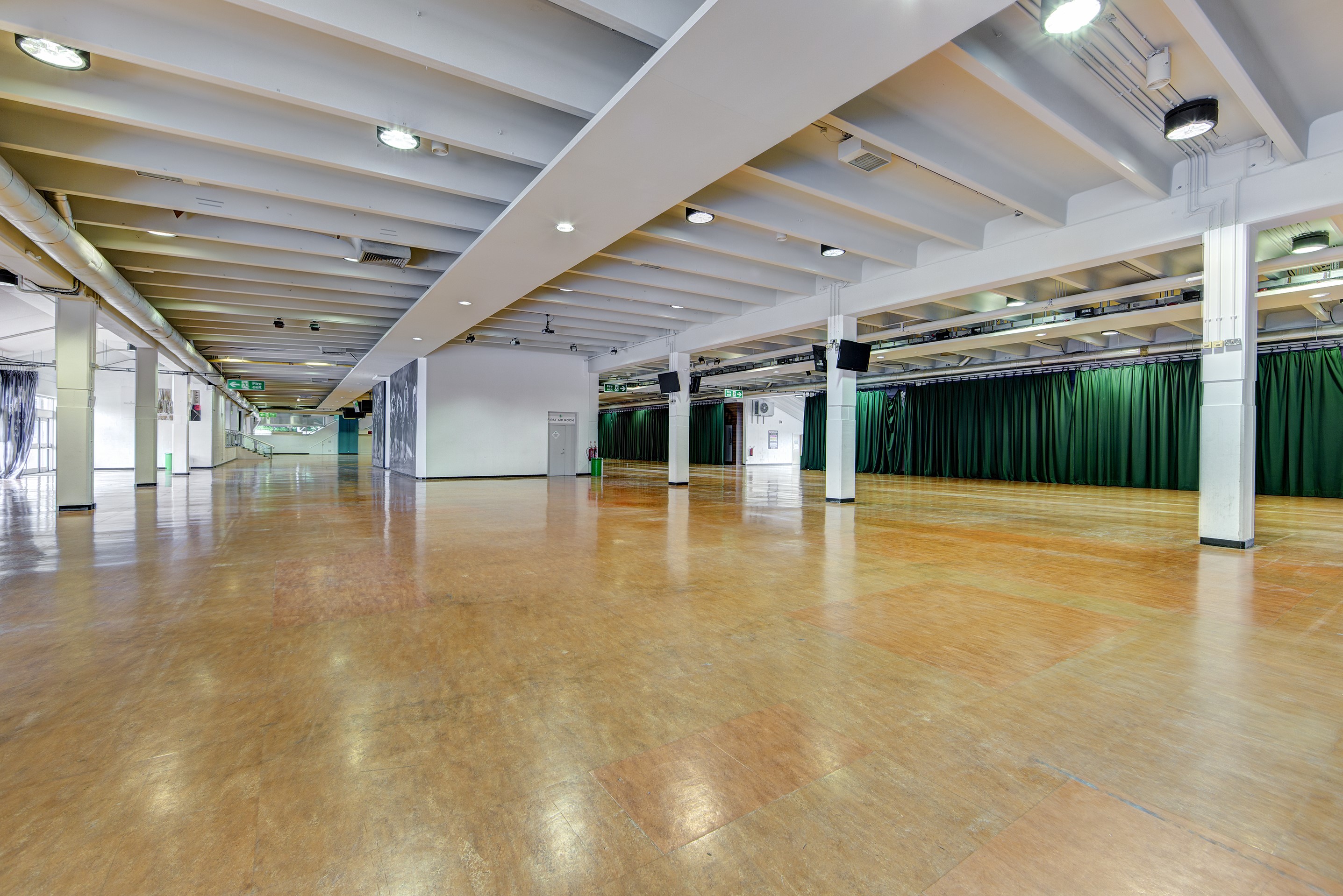 Surrey Hall at Sandown Park: spacious event venue with polished floors for conferences and gatherings.