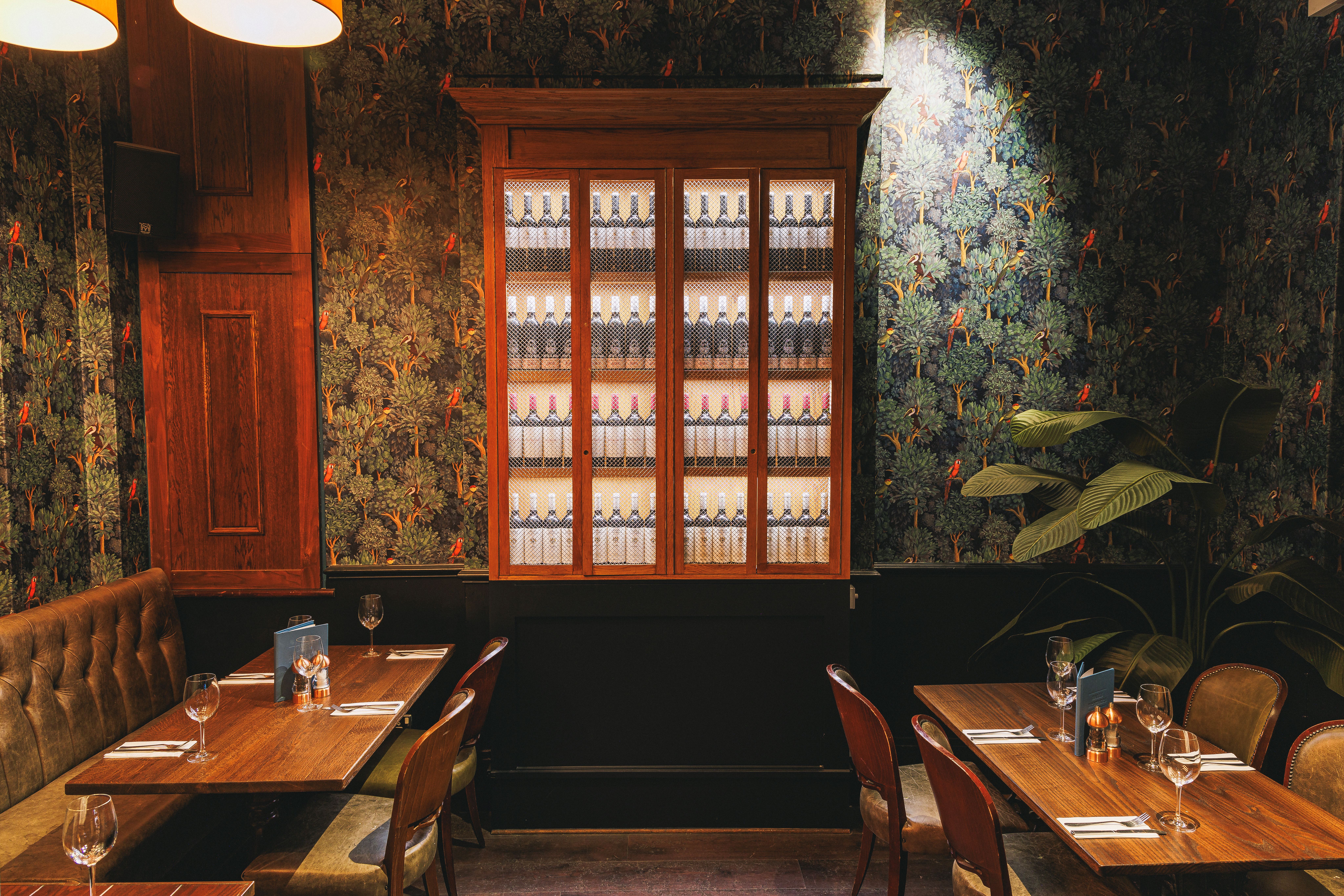 Cozy Green Room at Balls Brothers for intimate meetings and small events.