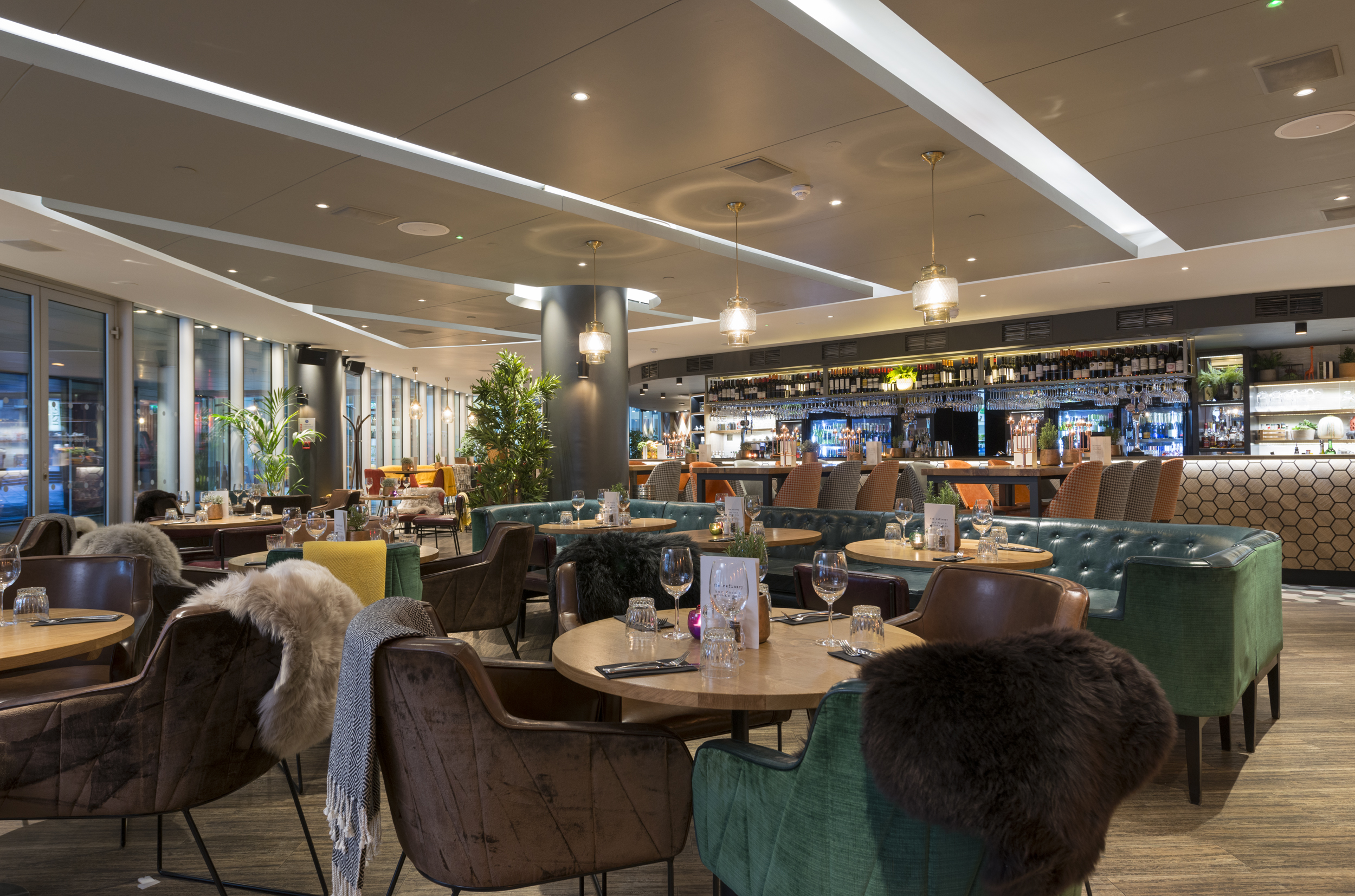 Modern restaurant venue with ambient lighting for events and meetings at The Refinery City Point.