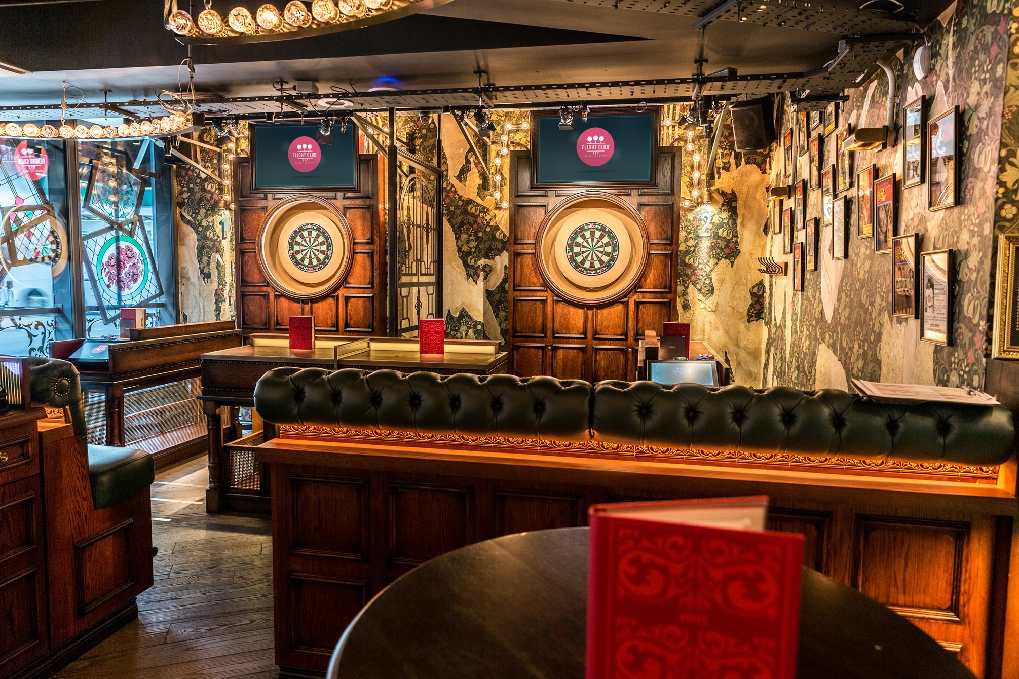 Stylish event space with dartboards for team-building and casual gatherings at Flight Club Bloomsbury.