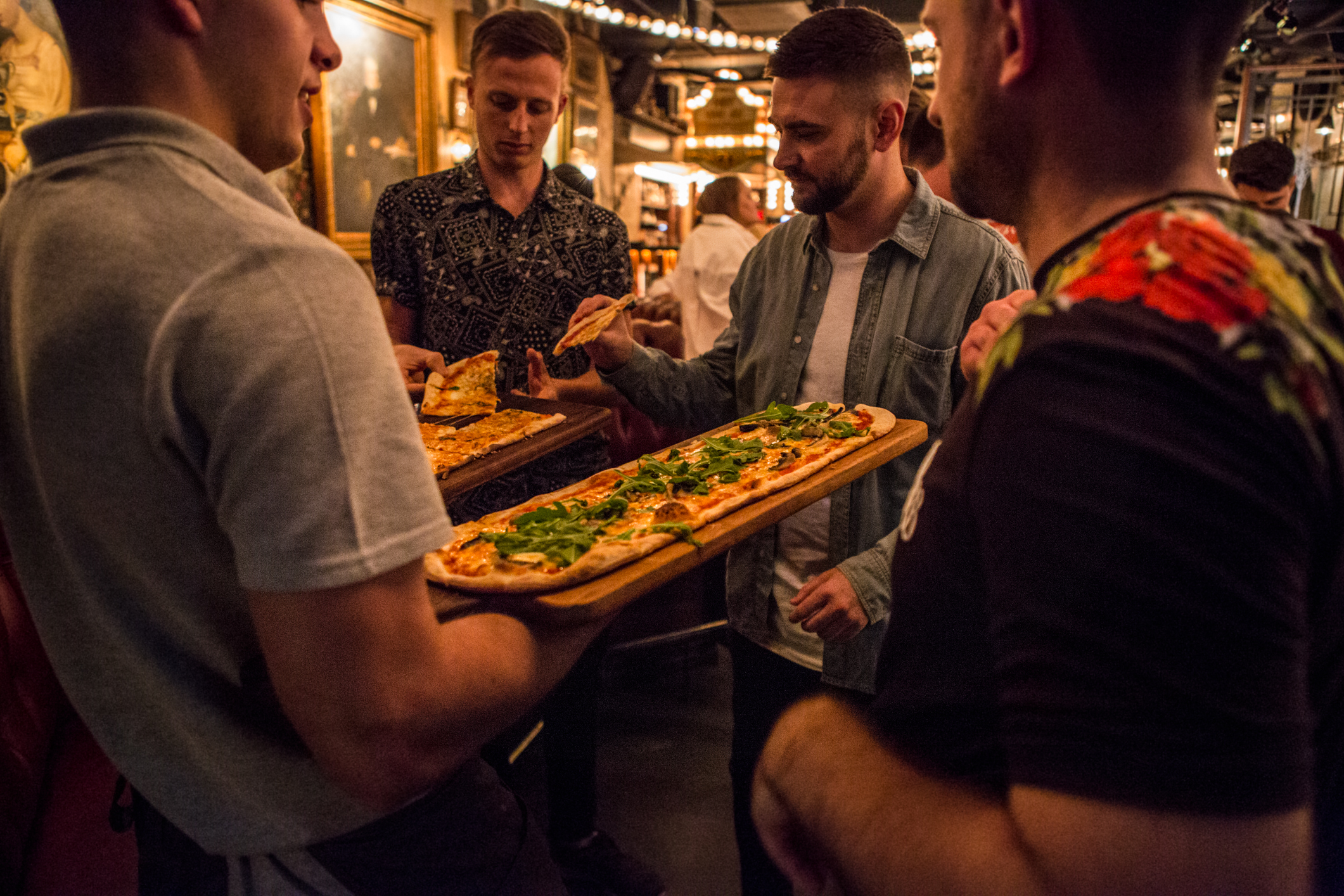 Lively networking event at Flight Club Bloomsbury with elegant catering and engaging atmosphere.