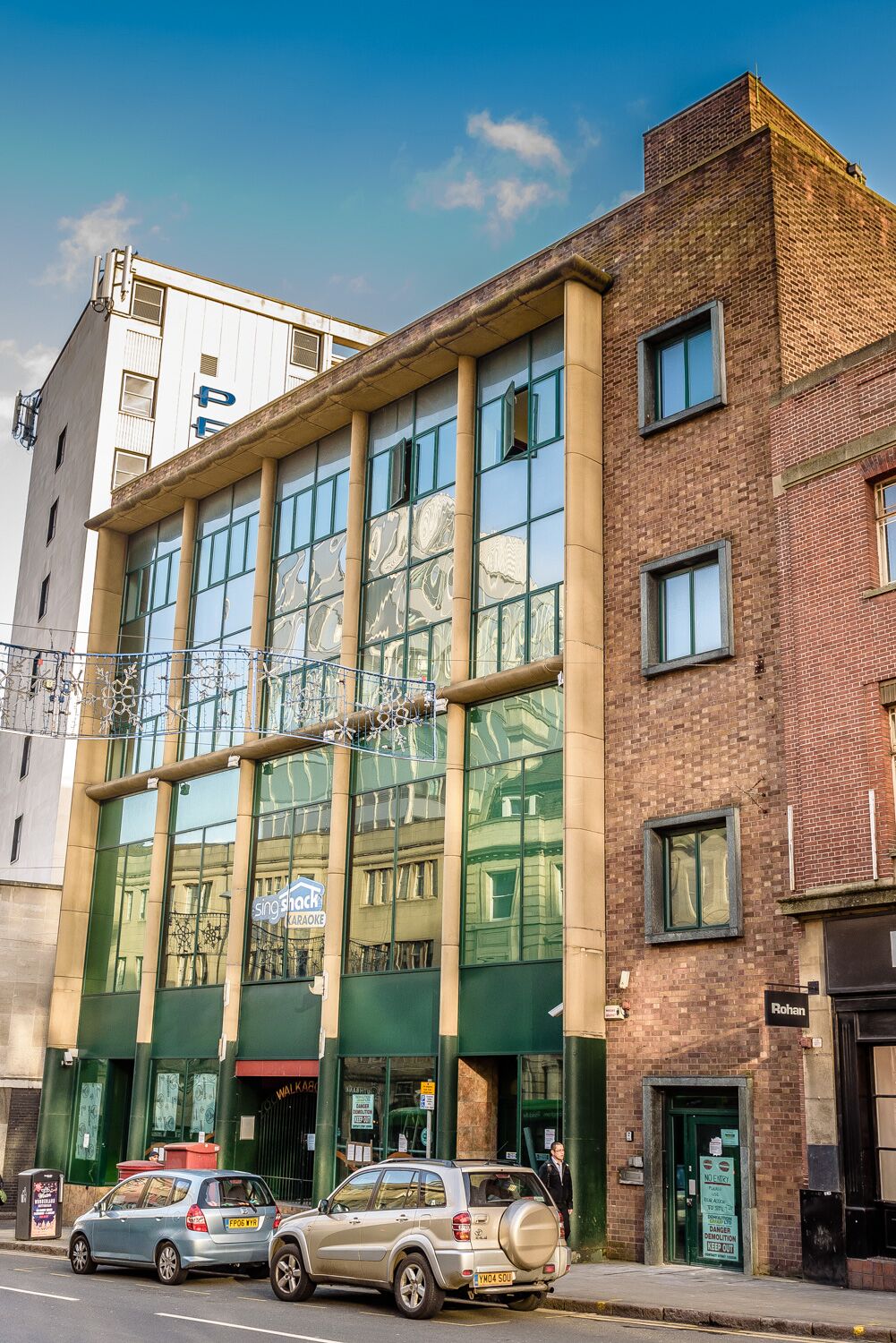 Modern Shooters Sports Bar with glass facade, perfect for corporate events and gatherings.