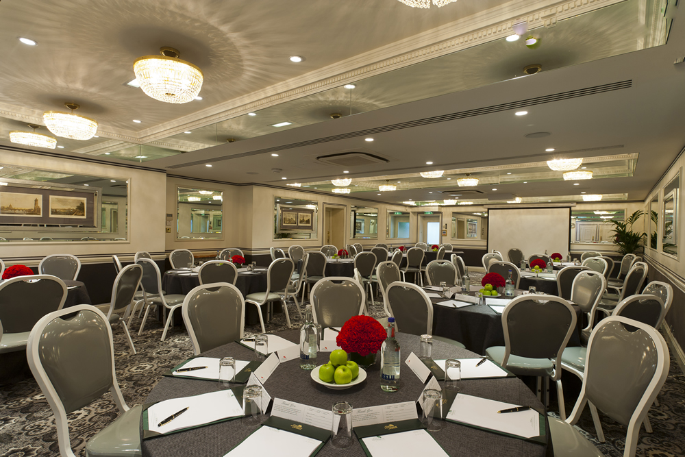 Great Russell Suite event space with elegant tables, perfect for meetings and conferences.
