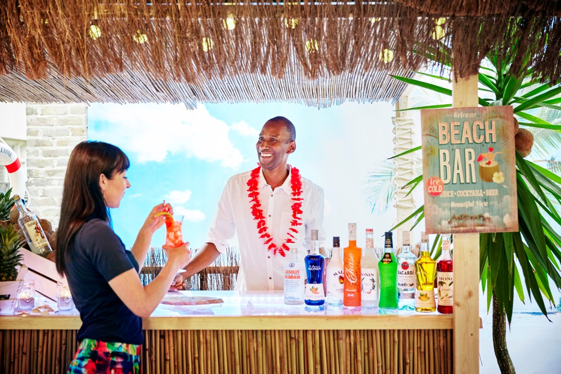 Vibrant beach bar at The Montague, perfect for networking events and social gatherings.