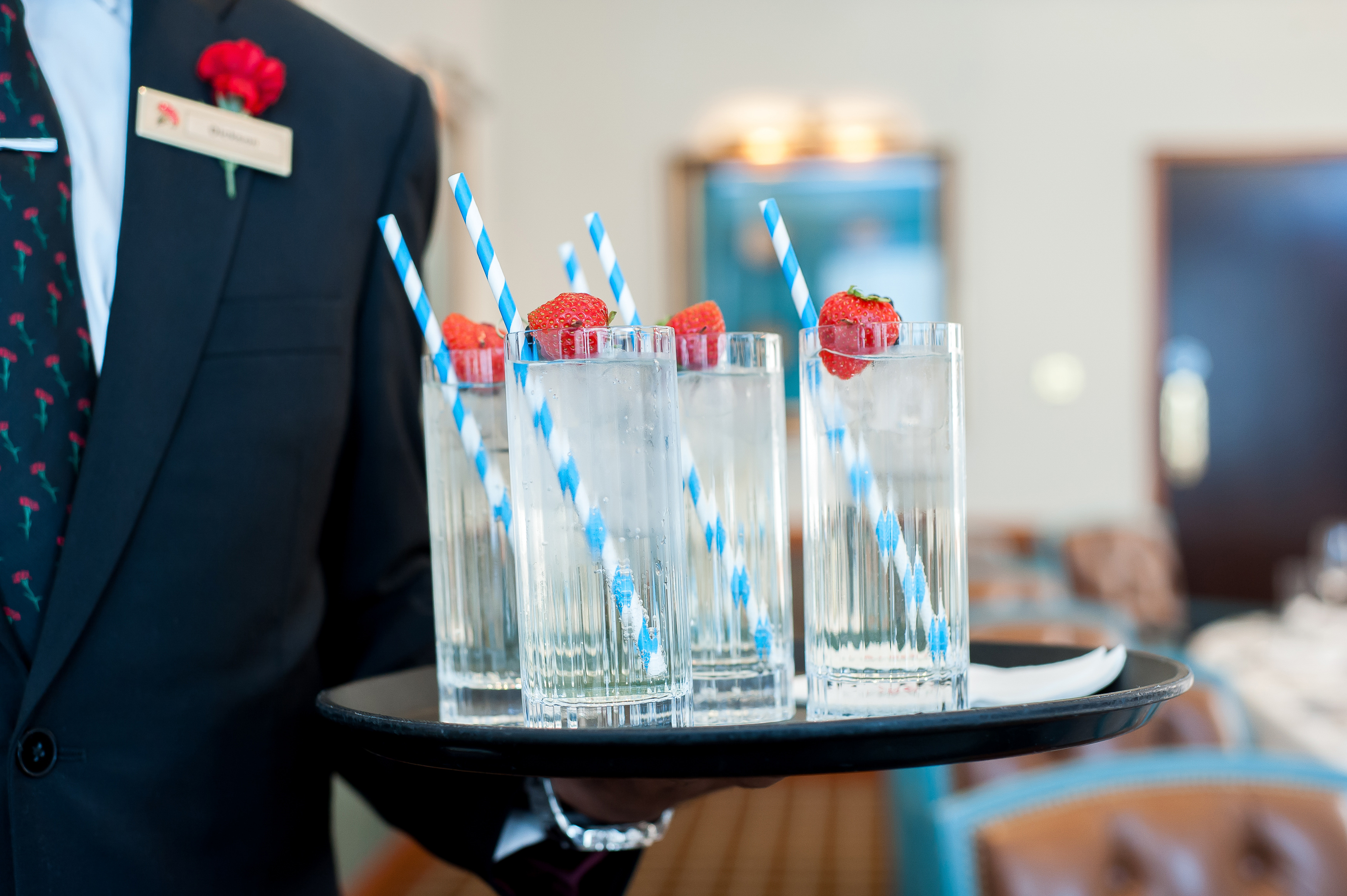 Elegant Van Dyke Suite event setup with garnished drinks and sophisticated decor.