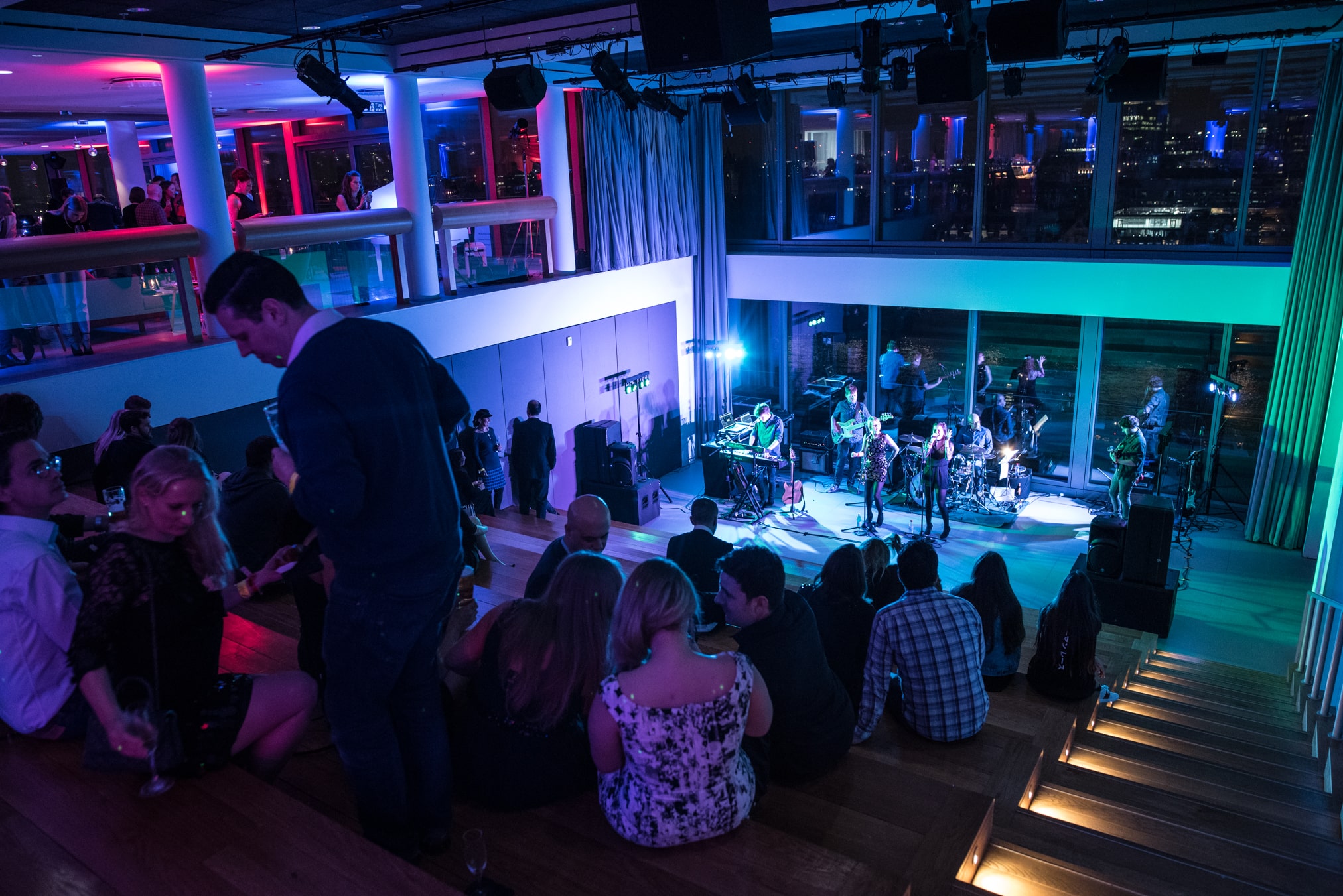 Amphitheatre at Sea Containers Events with live band, stylish lighting, networking venue.