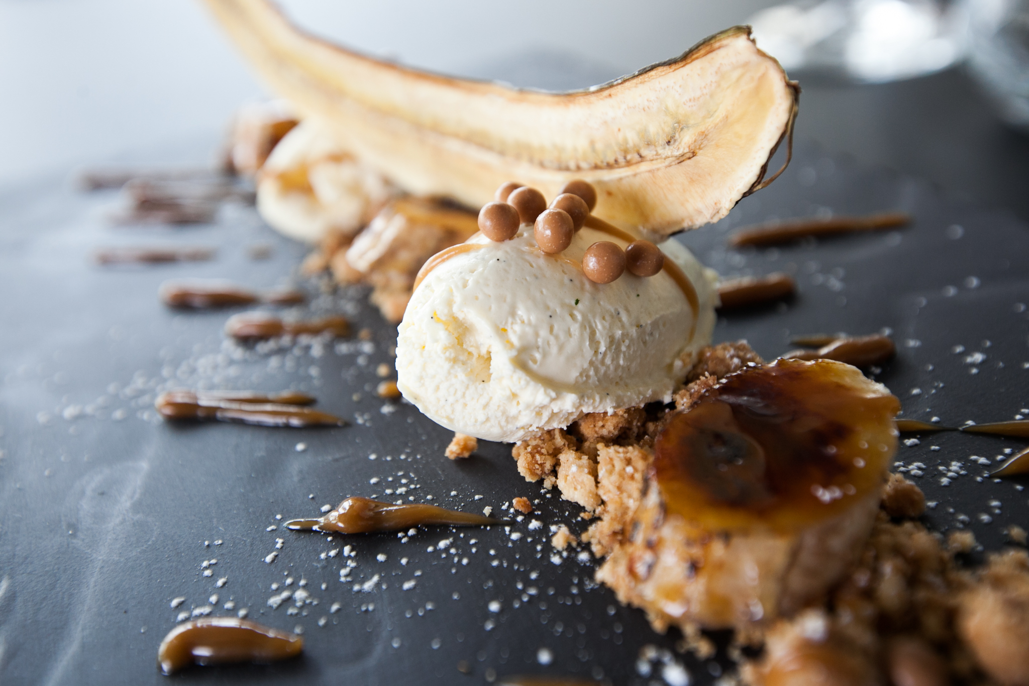 Elegant dessert with caramelized banana, ice cream for upscale events.