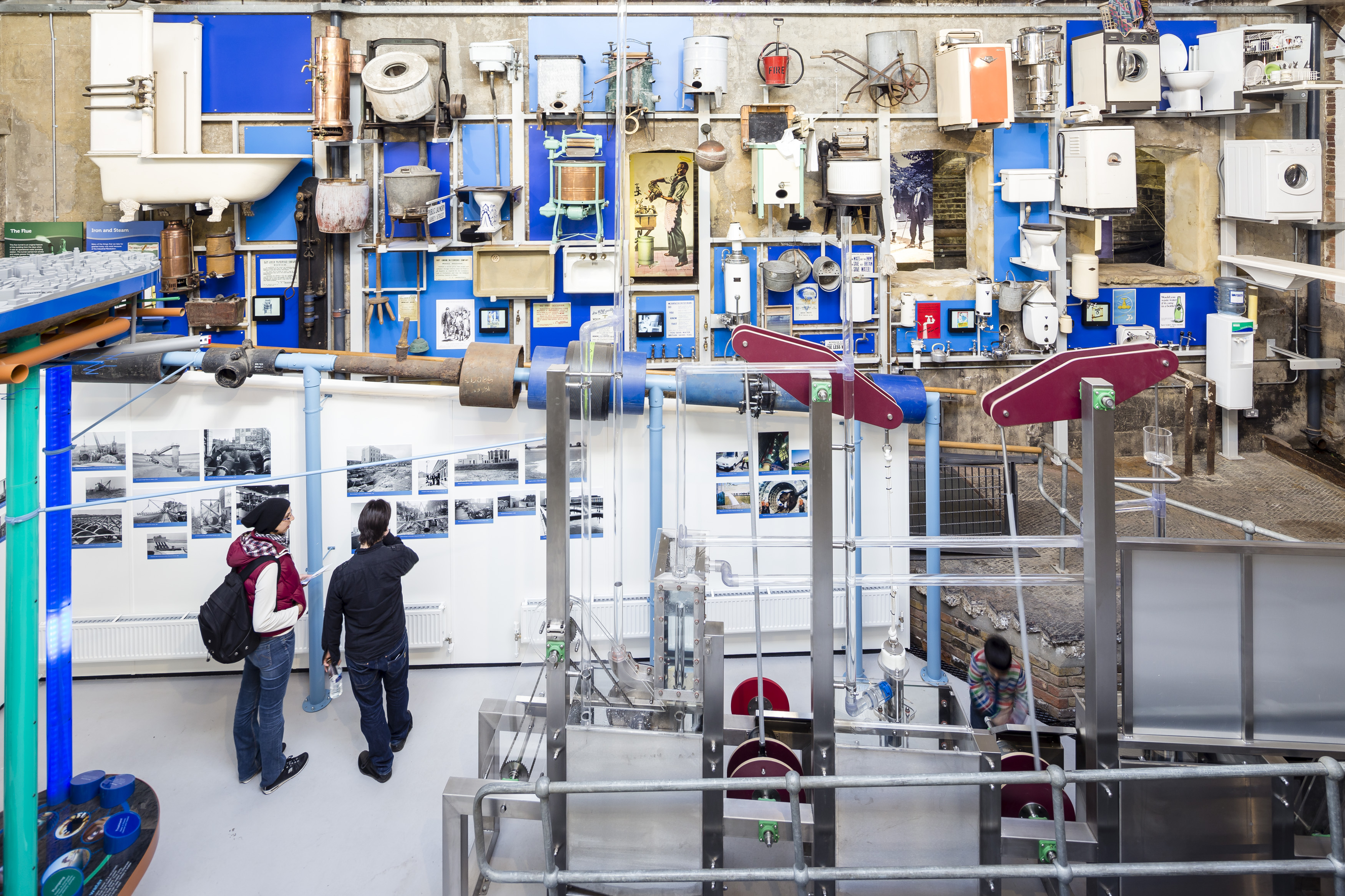 Steam Hall at London Museum: industrial venue with vibrant blue decor for creative events.