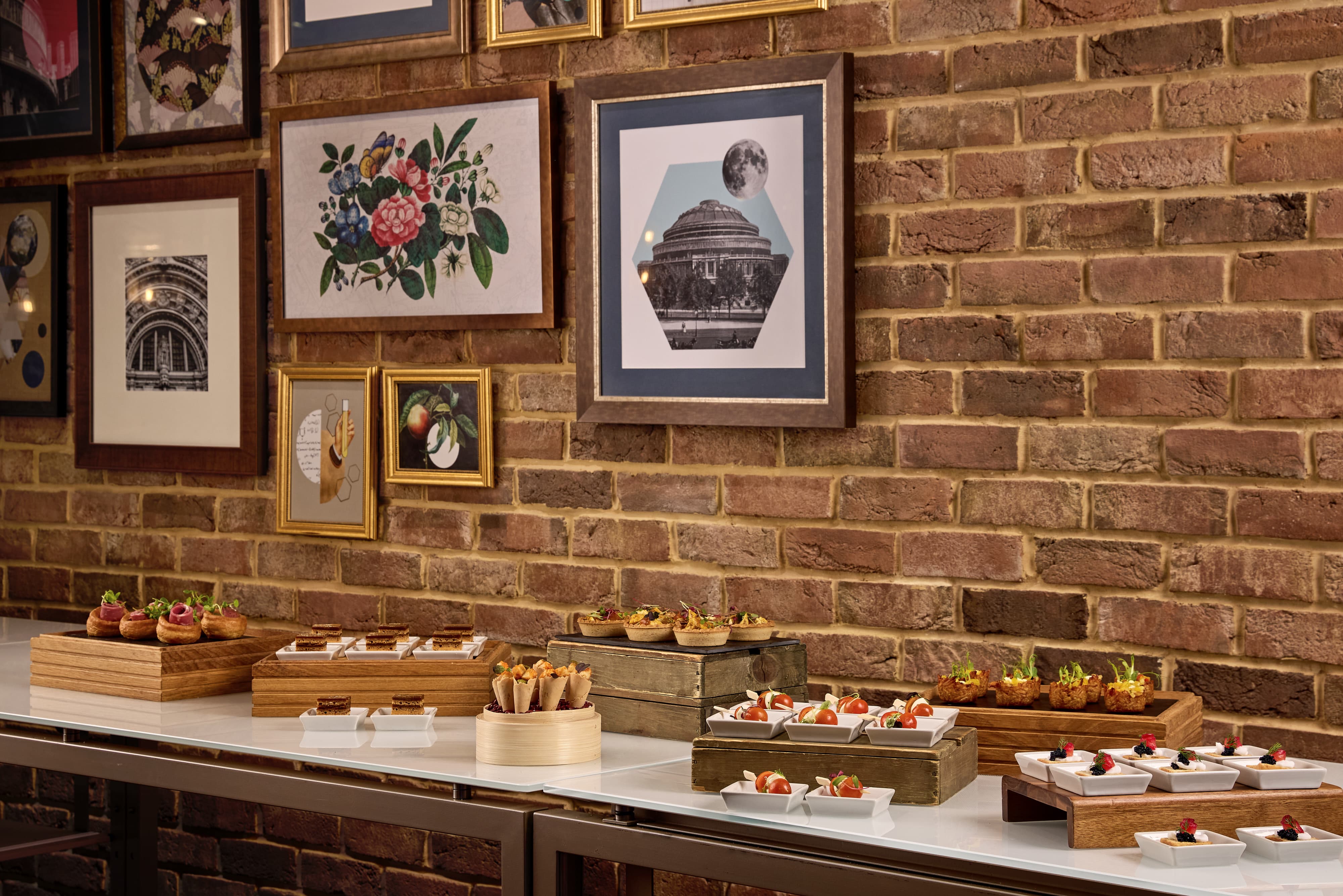 Tiered buffet display in London Marriott Kensington Gallery 2 for luxury event catering.