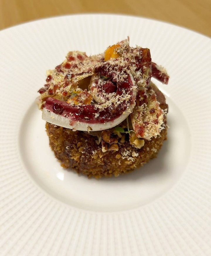 Gourmet dish in Windsor Suite, The Milestone Hotel, elegant event dining experience.