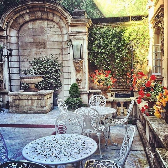 Charming Dartmouth House courtyard with elegant stone architecture for intimate events.