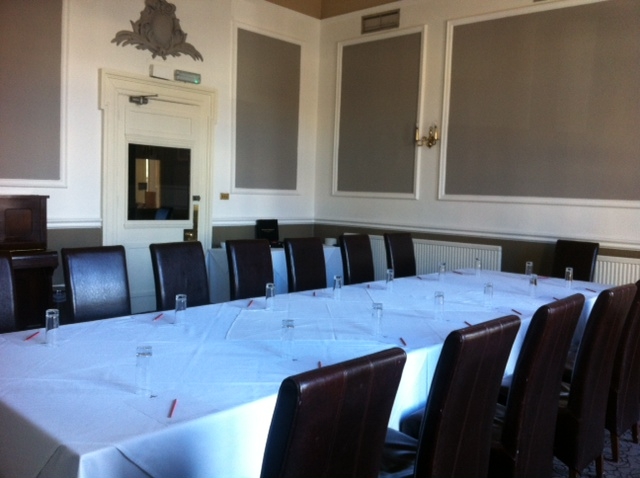 Lanchester Suite meeting room with long table, ideal for executive meetings and strategic planning.