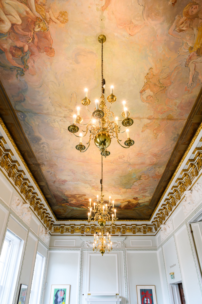 Opulent Barnard Room ceiling with chandeliers, ideal for weddings and gala dinners.
