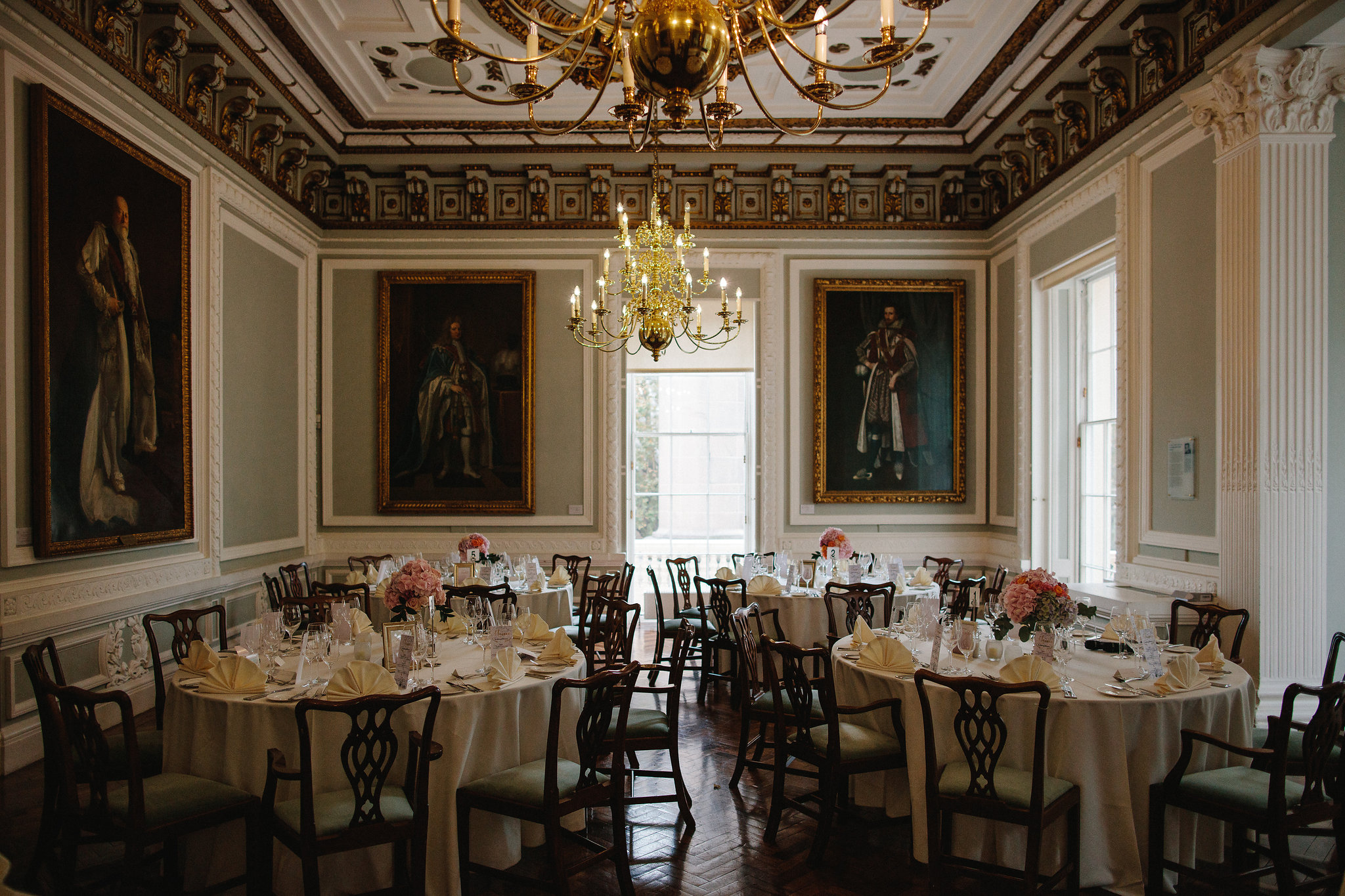 Elegant banquet room with round tables, ideal for upscale events and corporate functions.