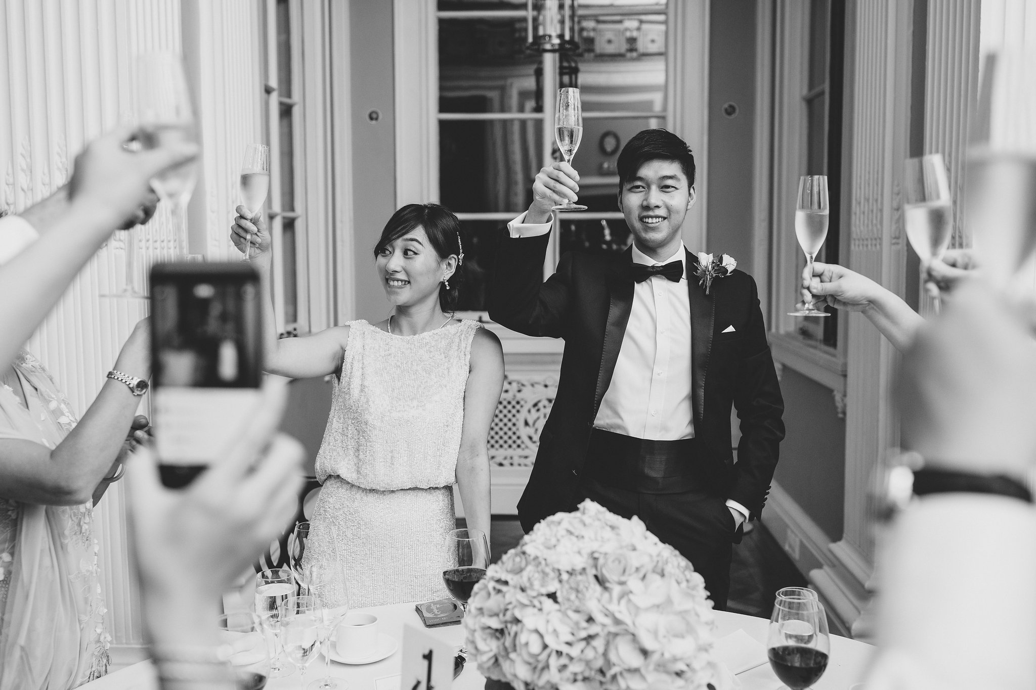 Wedding reception toast in elegant Council Room, Carlton House Terrace.