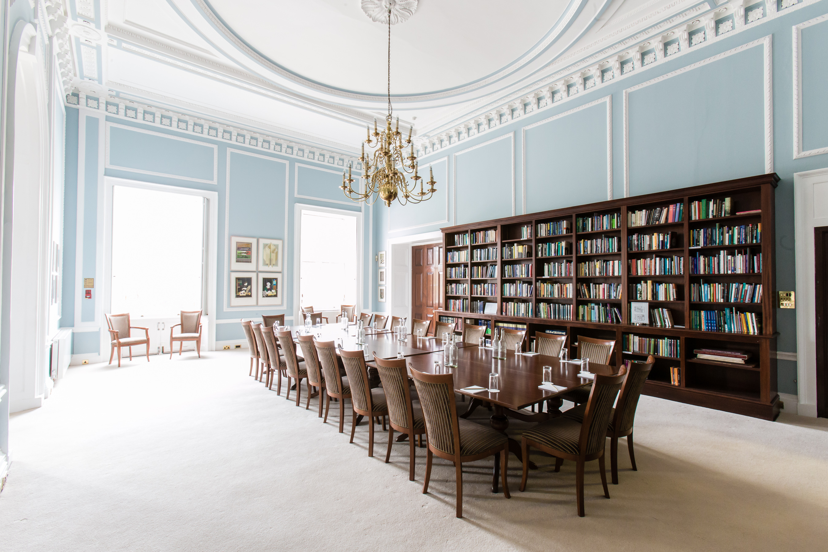 Elegant Reading Room with chandelier, perfect for executive meetings and intimate events.