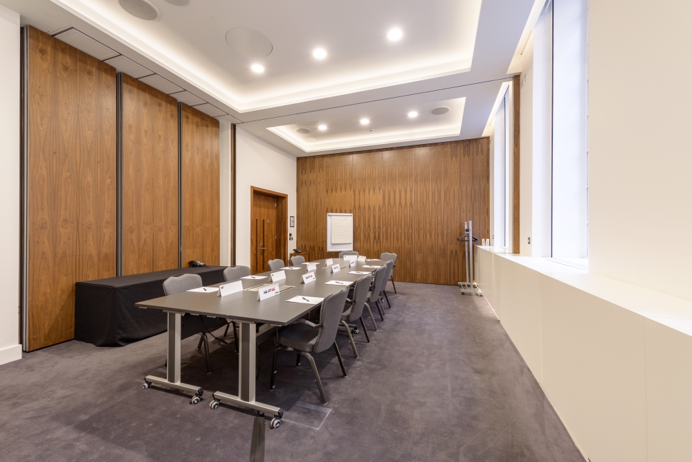 Blumlein Rooms meeting space with modern table setup, ideal for workshops and strategy sessions.