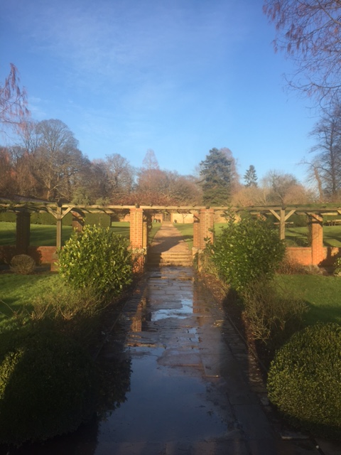 Main Lawn in Cannizaro Park, lush greenery archway, ideal for weddings and corporate events.