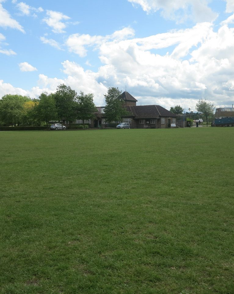 Spacious Wimbledon Park venue with green lawn for outdoor events and gatherings.