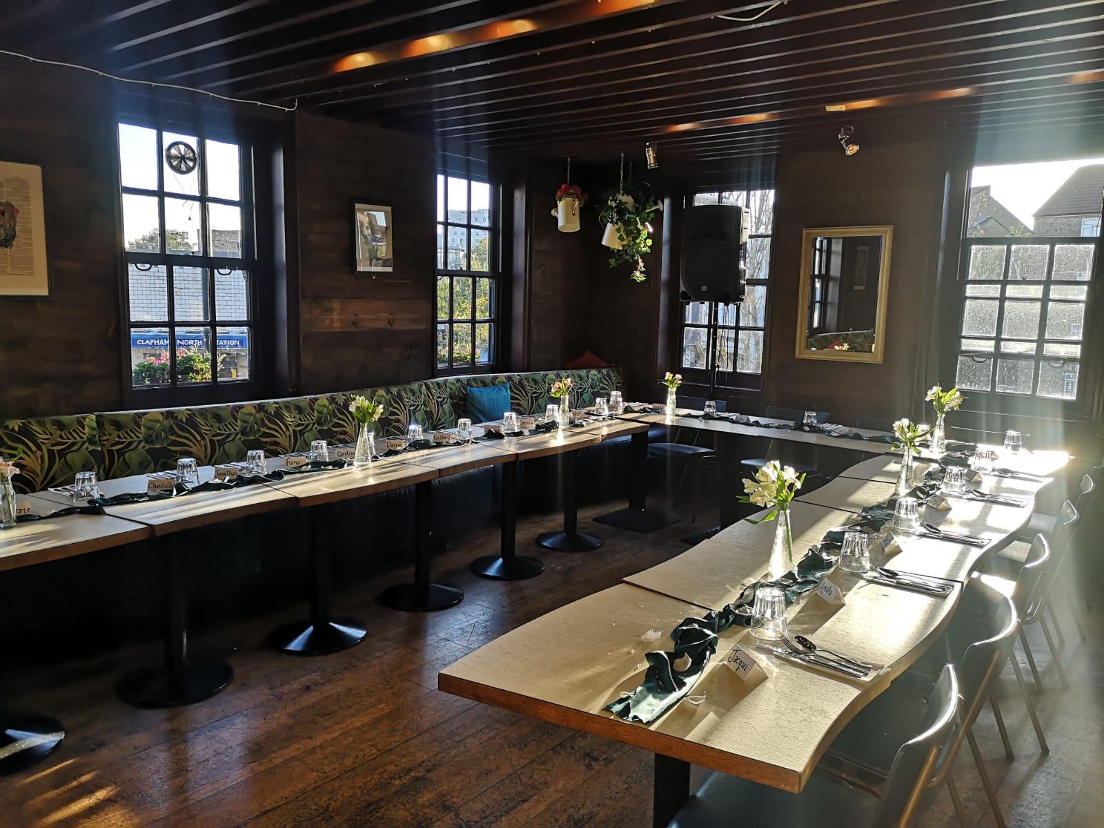 Main Function Room at The Treehouse, elegant table setup for corporate meetings and events.