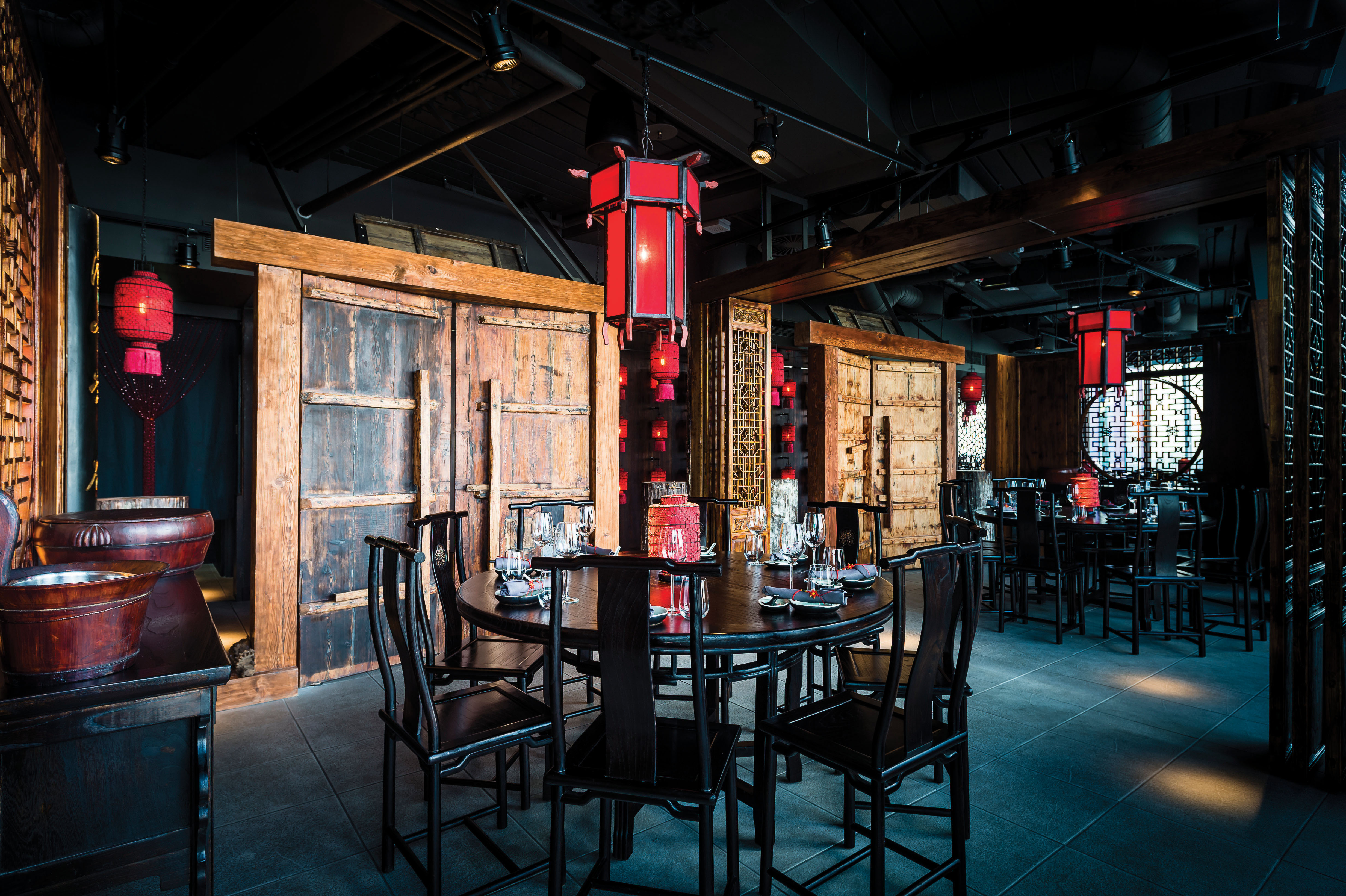 Shanghai private dining room with red lanterns, perfect for intimate gatherings and events.