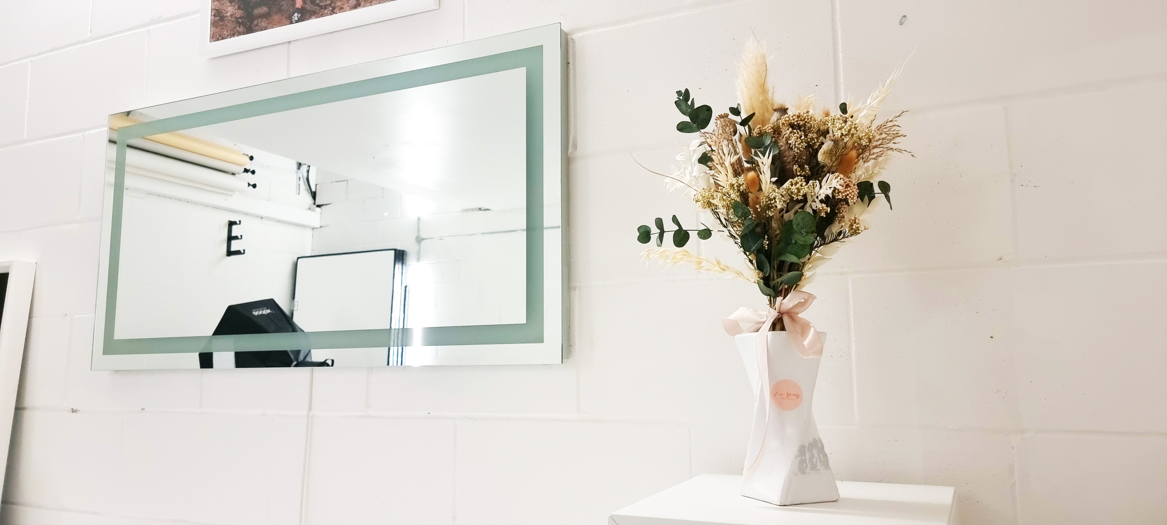 Stylish floral arrangement in modern workshop studio for corporate events and meetings.